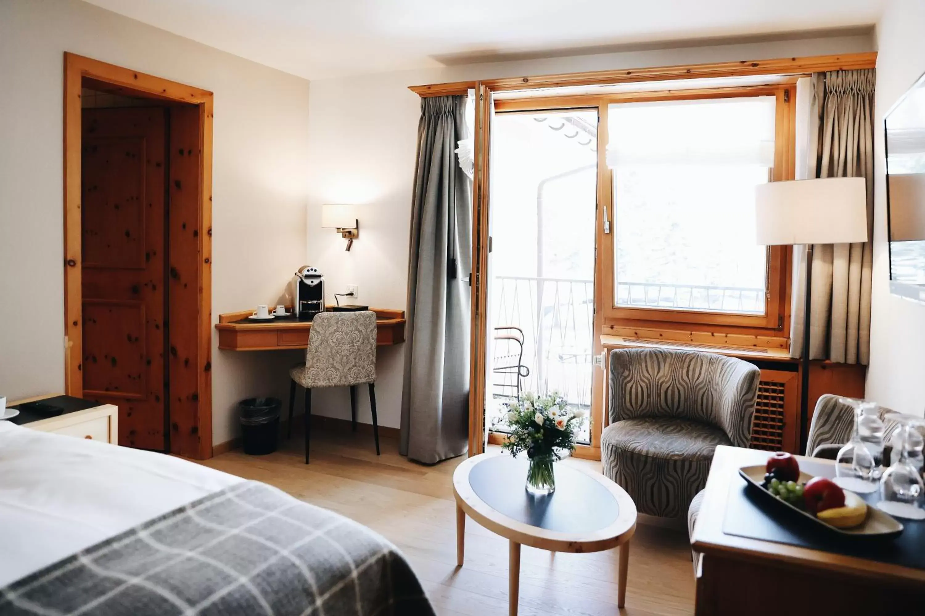 Bedroom, Seating Area in Hotel Steinbock Pontresina