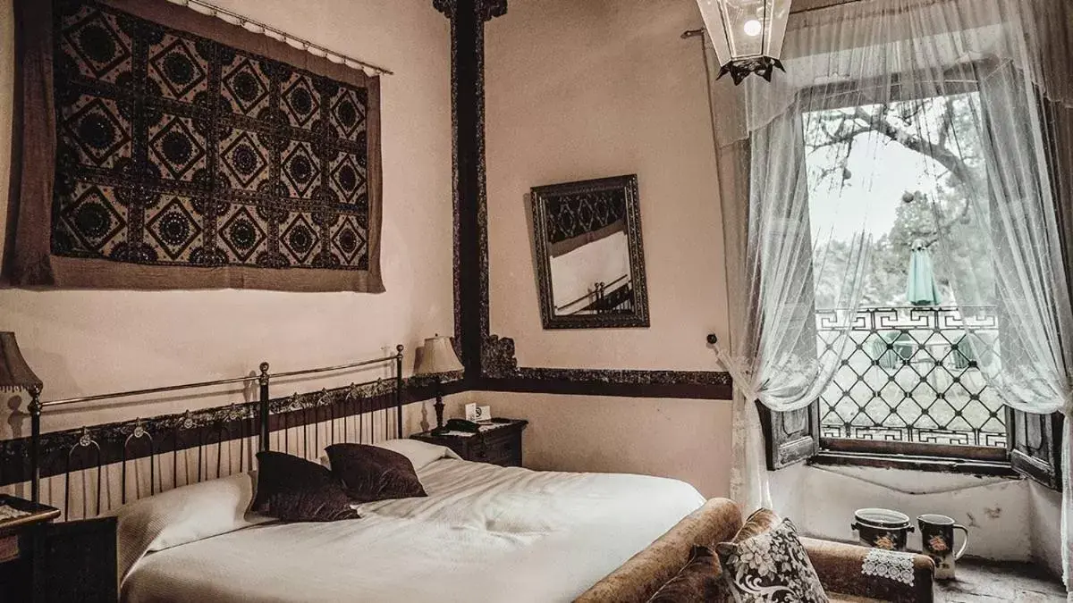Photo of the whole room, Bed in Hacienda Sepulveda Hotel & Spa