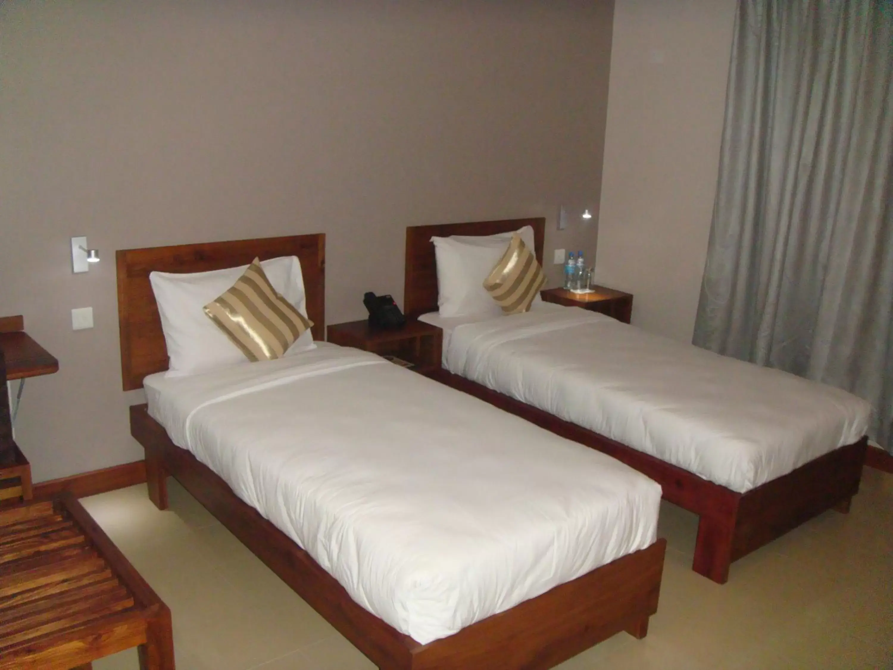 Bed in Venus Premier Hotel