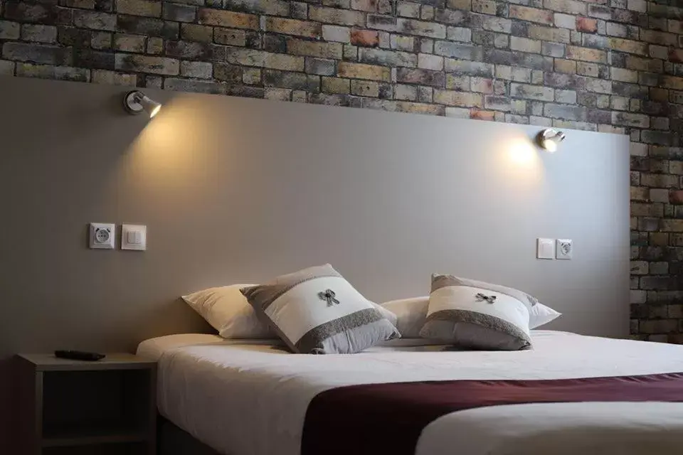 Bed in Hotel de Normandie