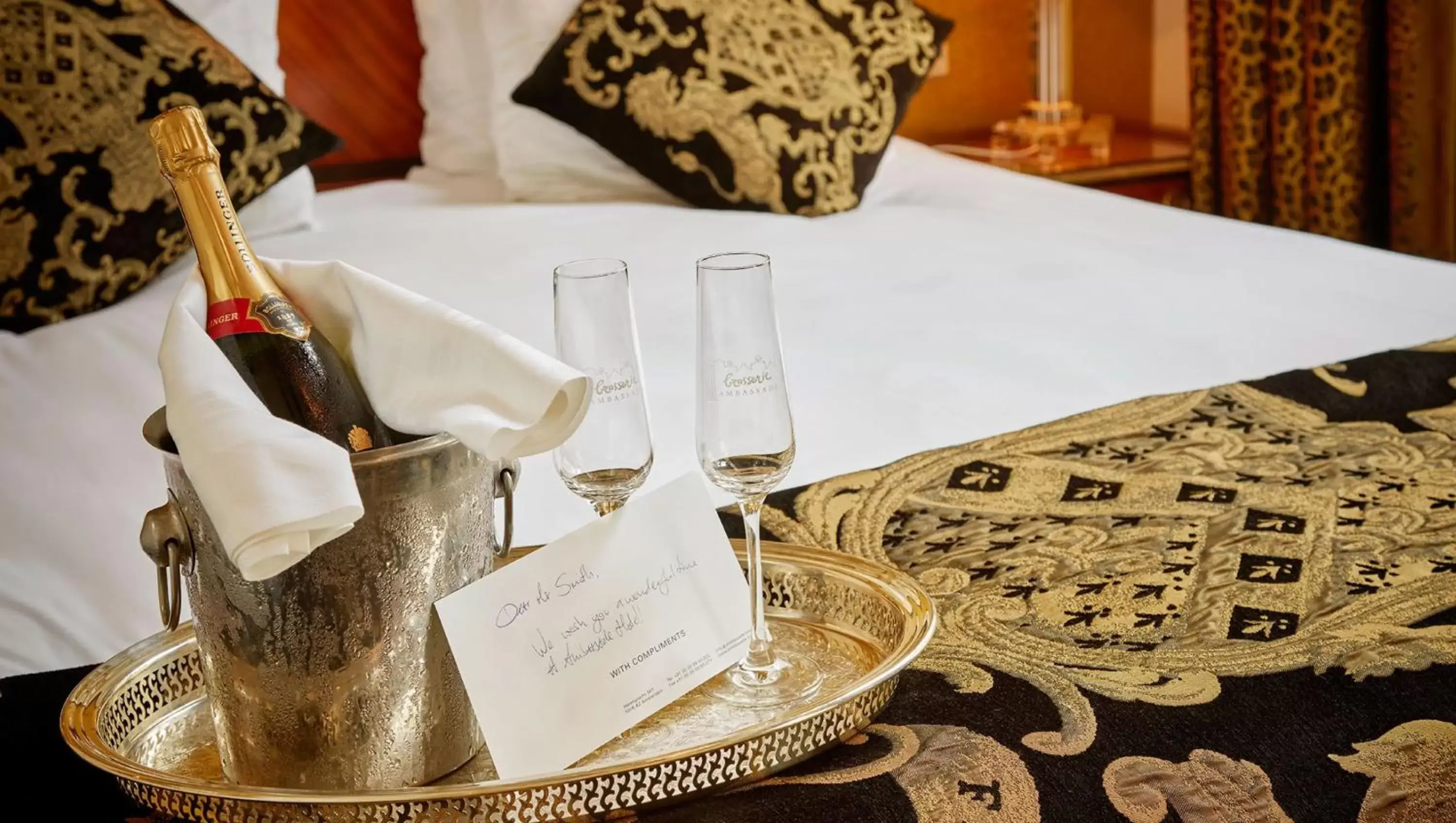 Bed, Drinks in Ambassade Hotel