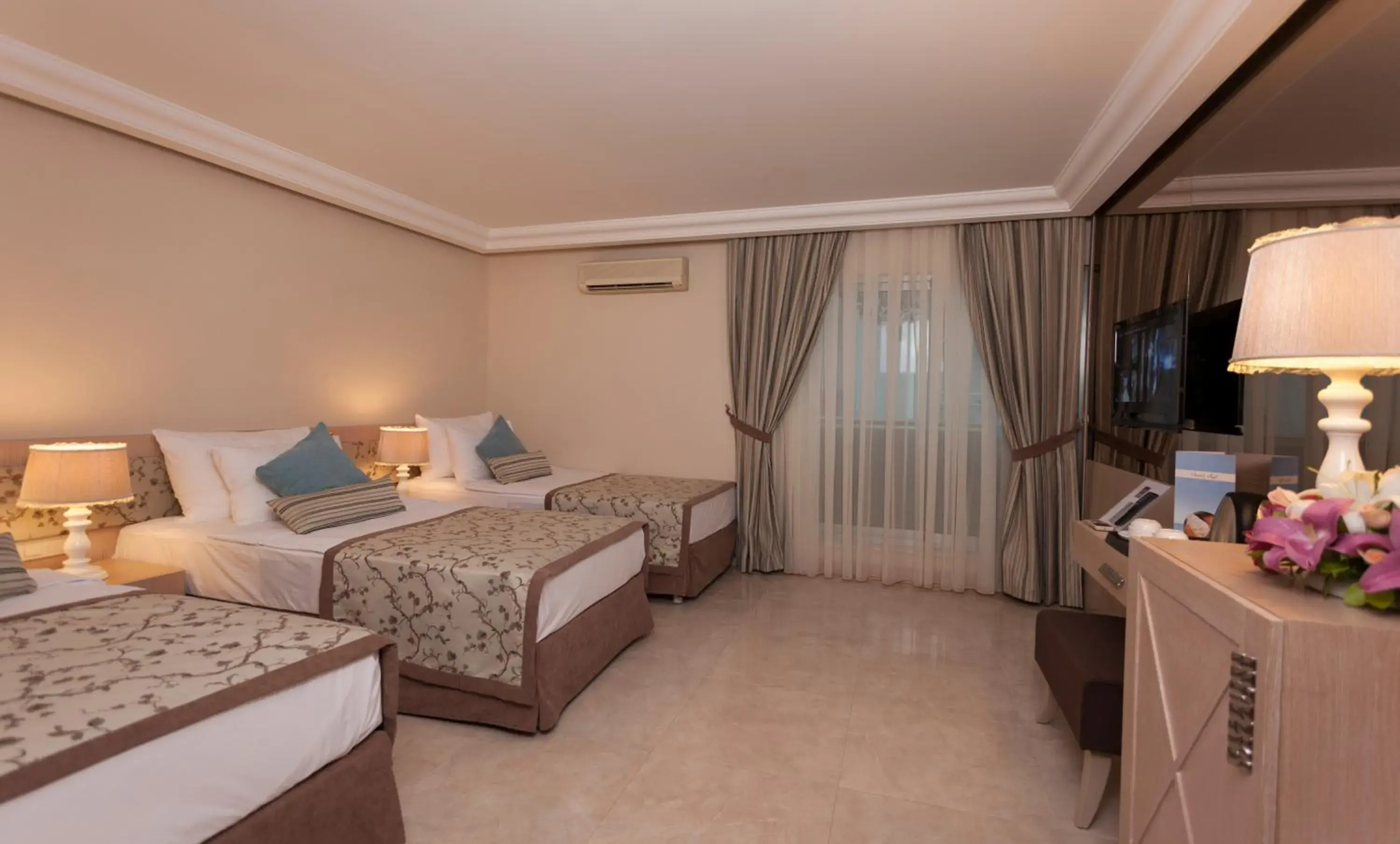 Bed in Xperia Saray Beach Hotel
