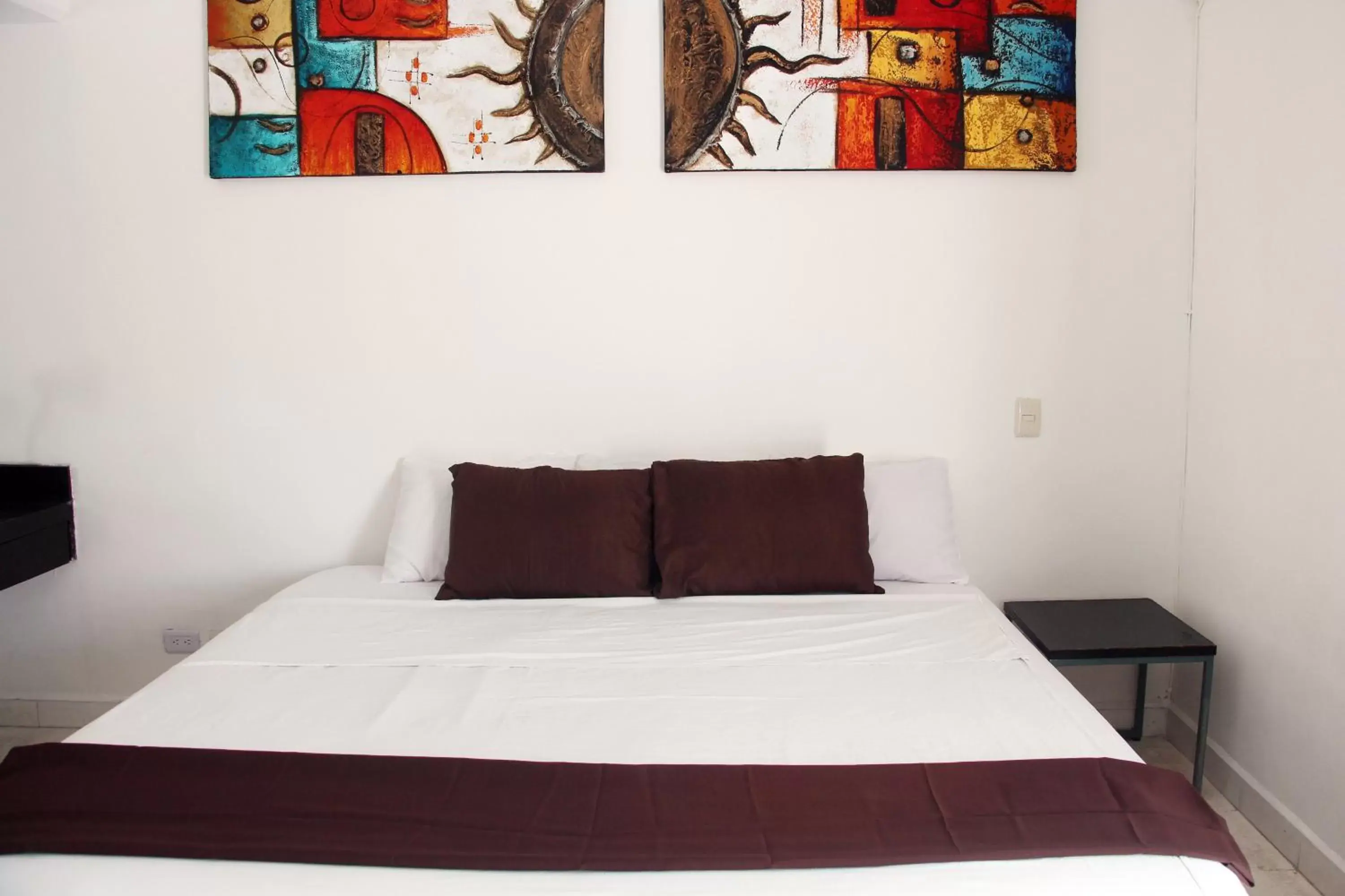 Photo of the whole room, Bed in Hotel & Hostal Casa de Luz Cancun