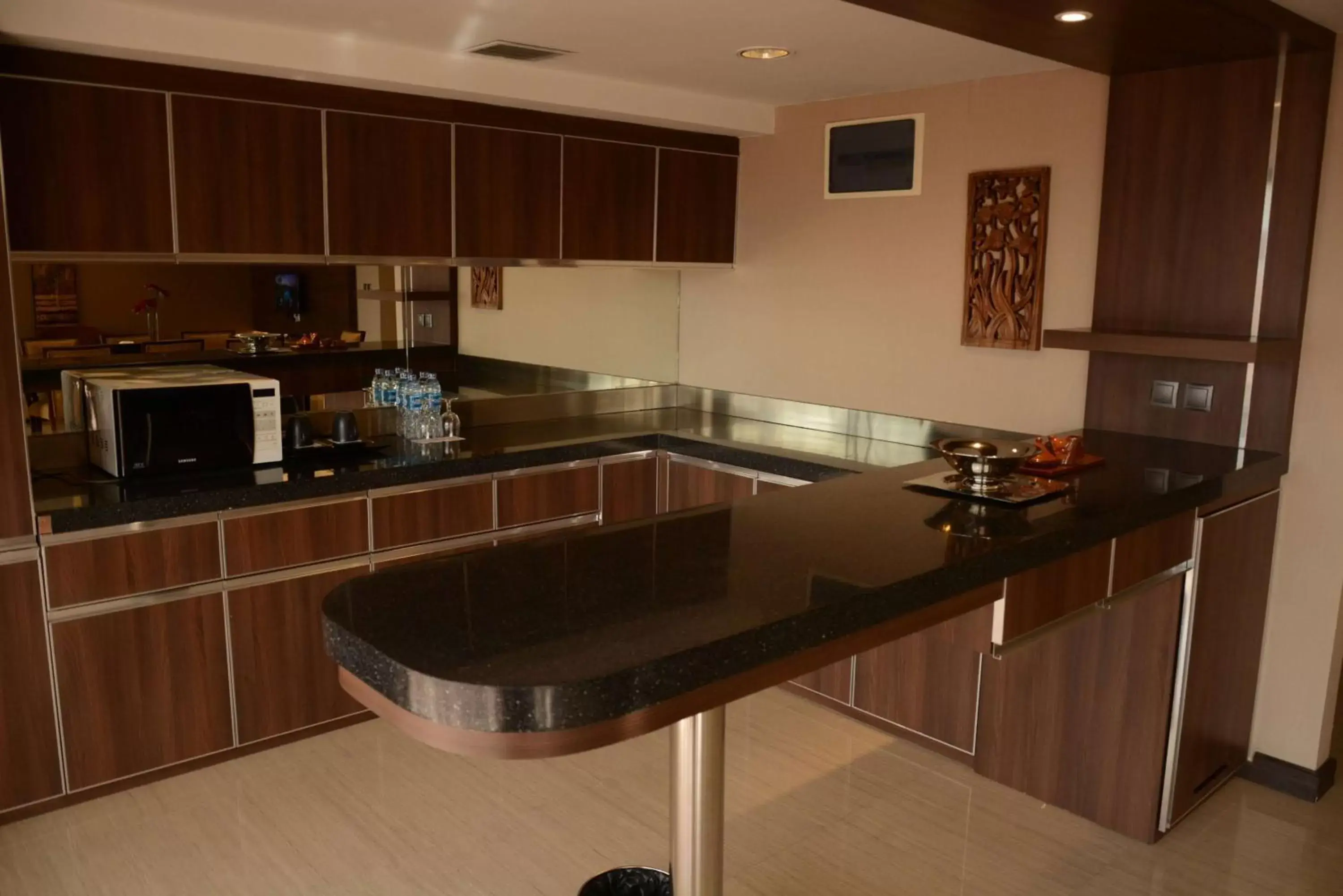 Photo of the whole room, Kitchen/Kitchenette in Ramada by Wyndham Bali Sunset Road Kuta