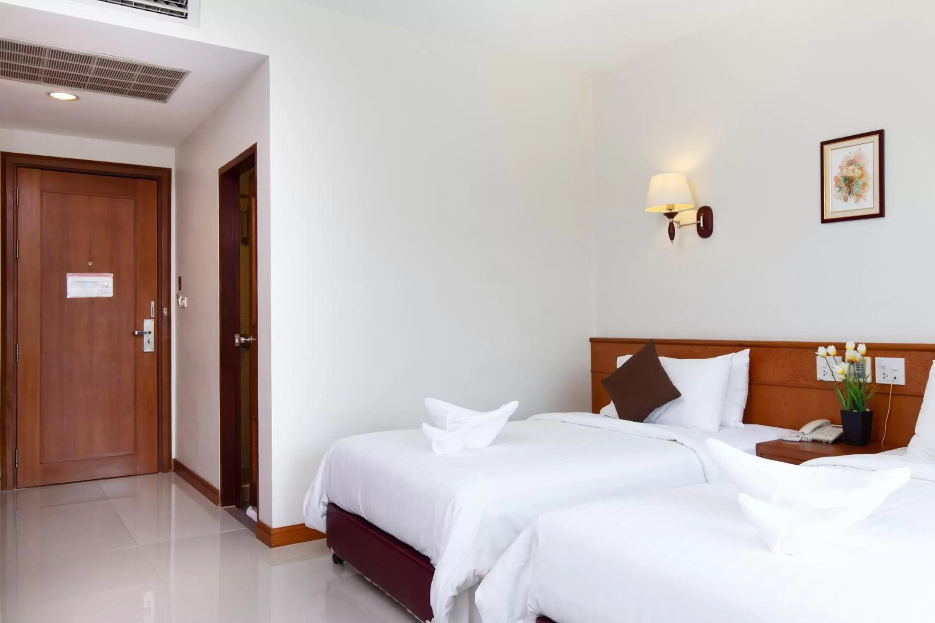 Bed in Kanchanaburi City Hotel - SHA Extra Plus