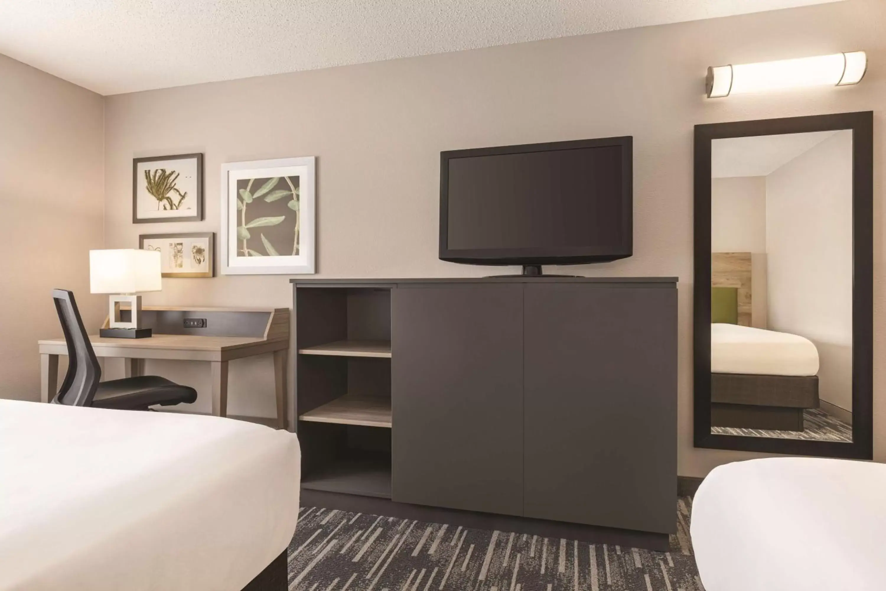 Bedroom, TV/Entertainment Center in Country Inn & Suites by Radisson, St. Cloud East, MN