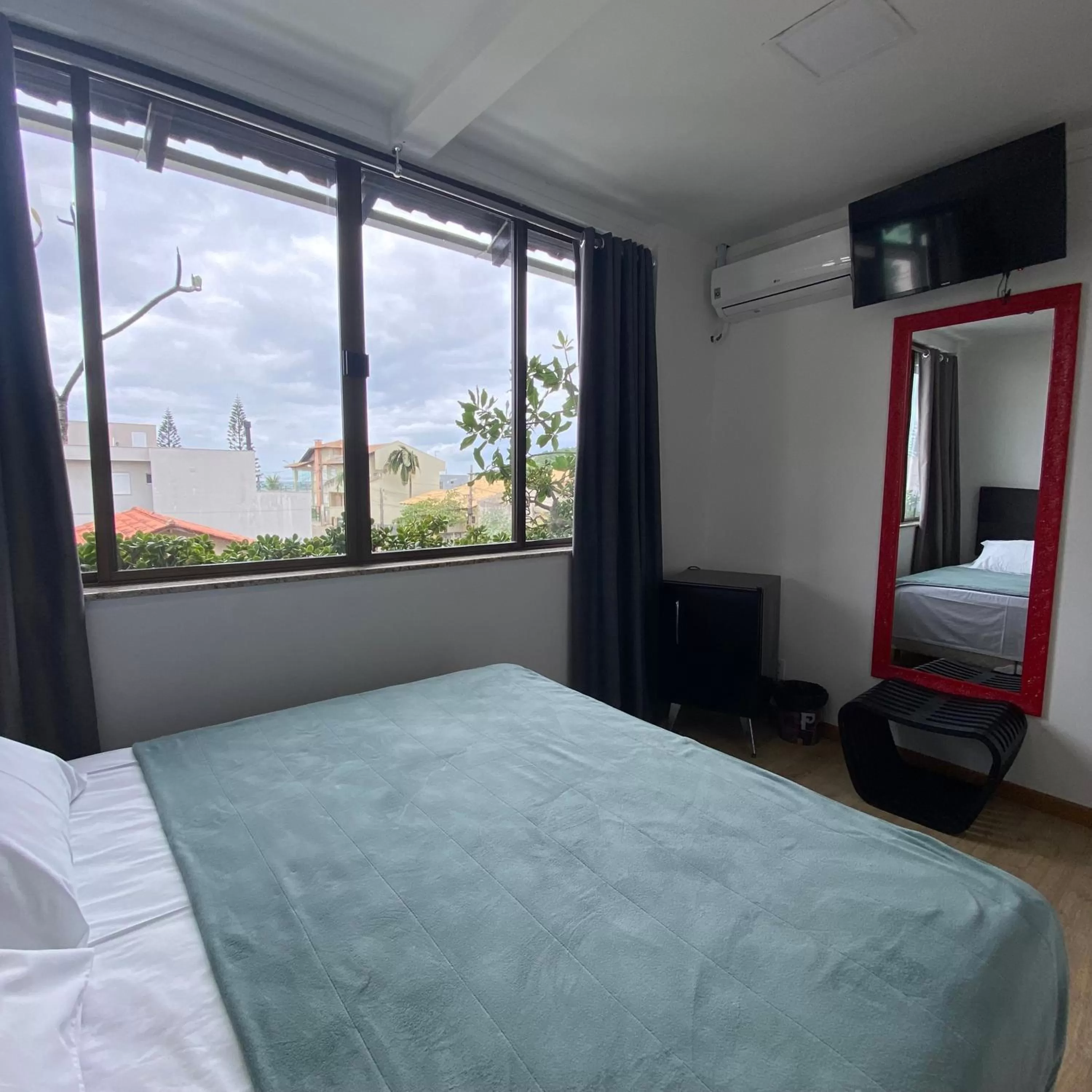 Bed in Pousada Casa da Praia