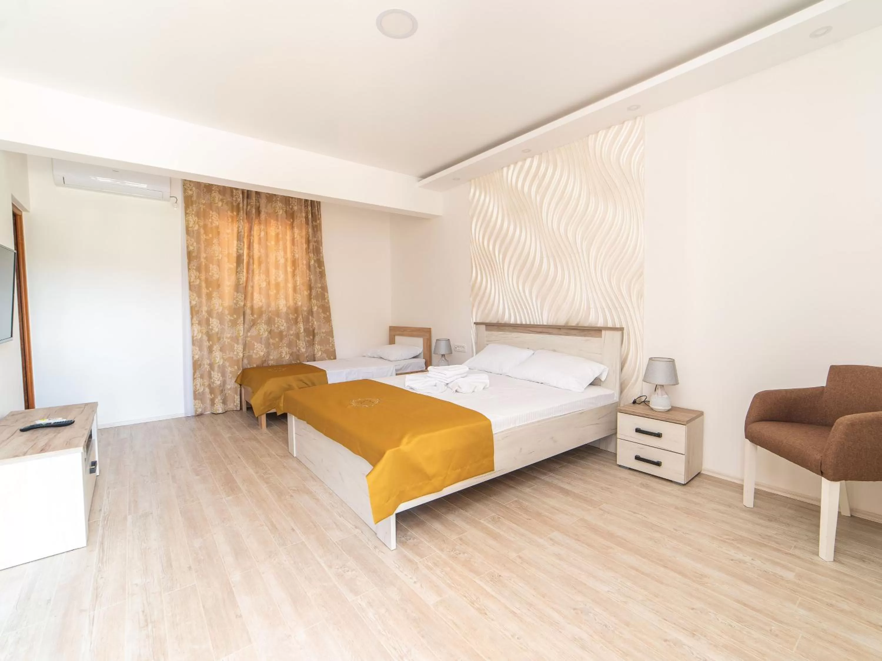 Bed in Hotel Royal Garden