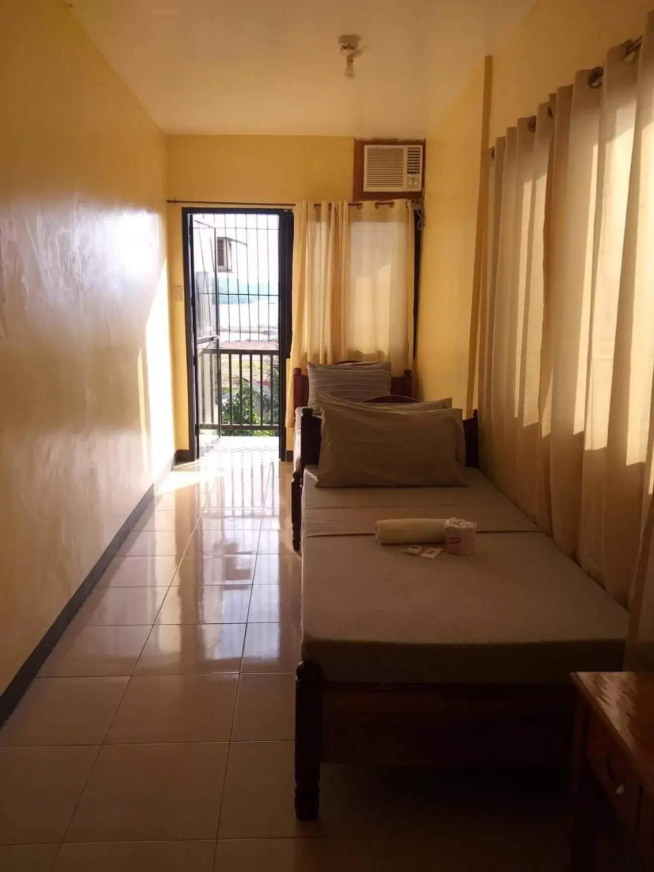 Bedroom, Seating Area in Divine Castle Travelers Inn