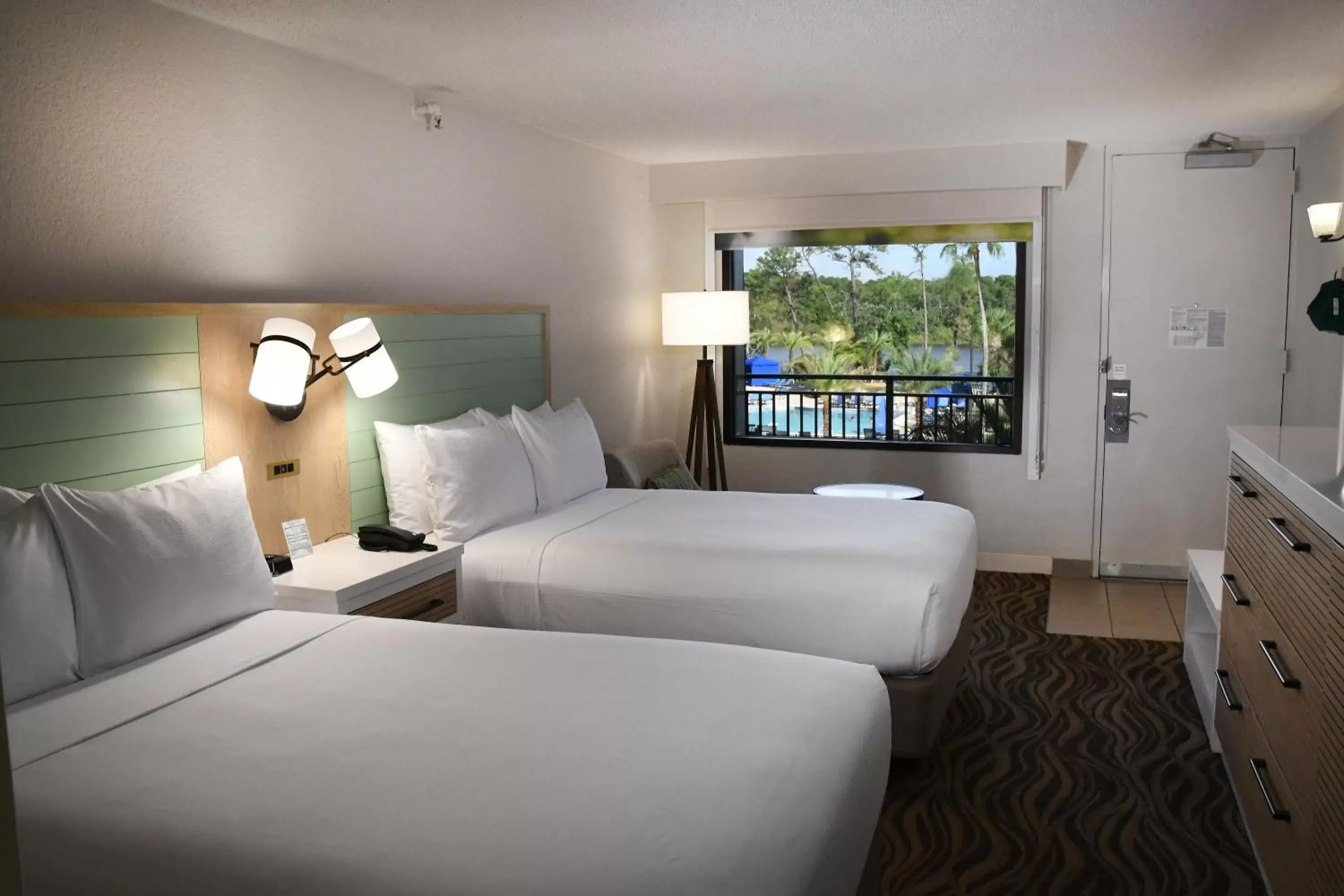 Bed in Wyndham Garden Lake Buena Vista Disney Springs® Resort Area