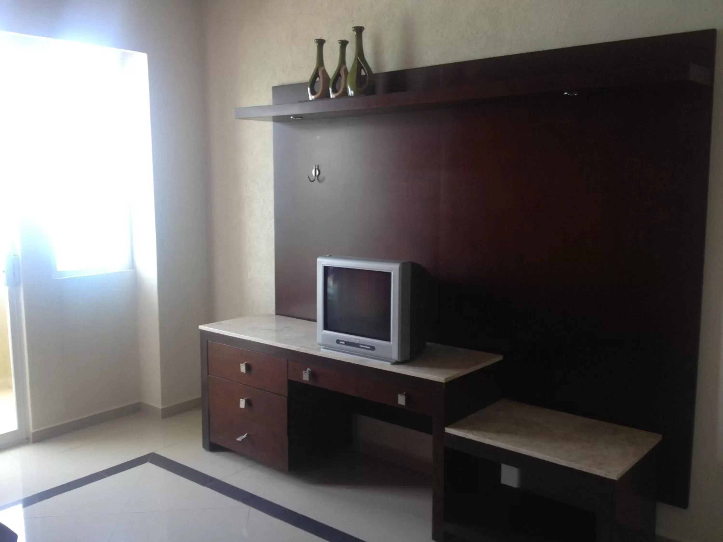 TV and multimedia, TV/Entertainment Center in Hotel Bogavante