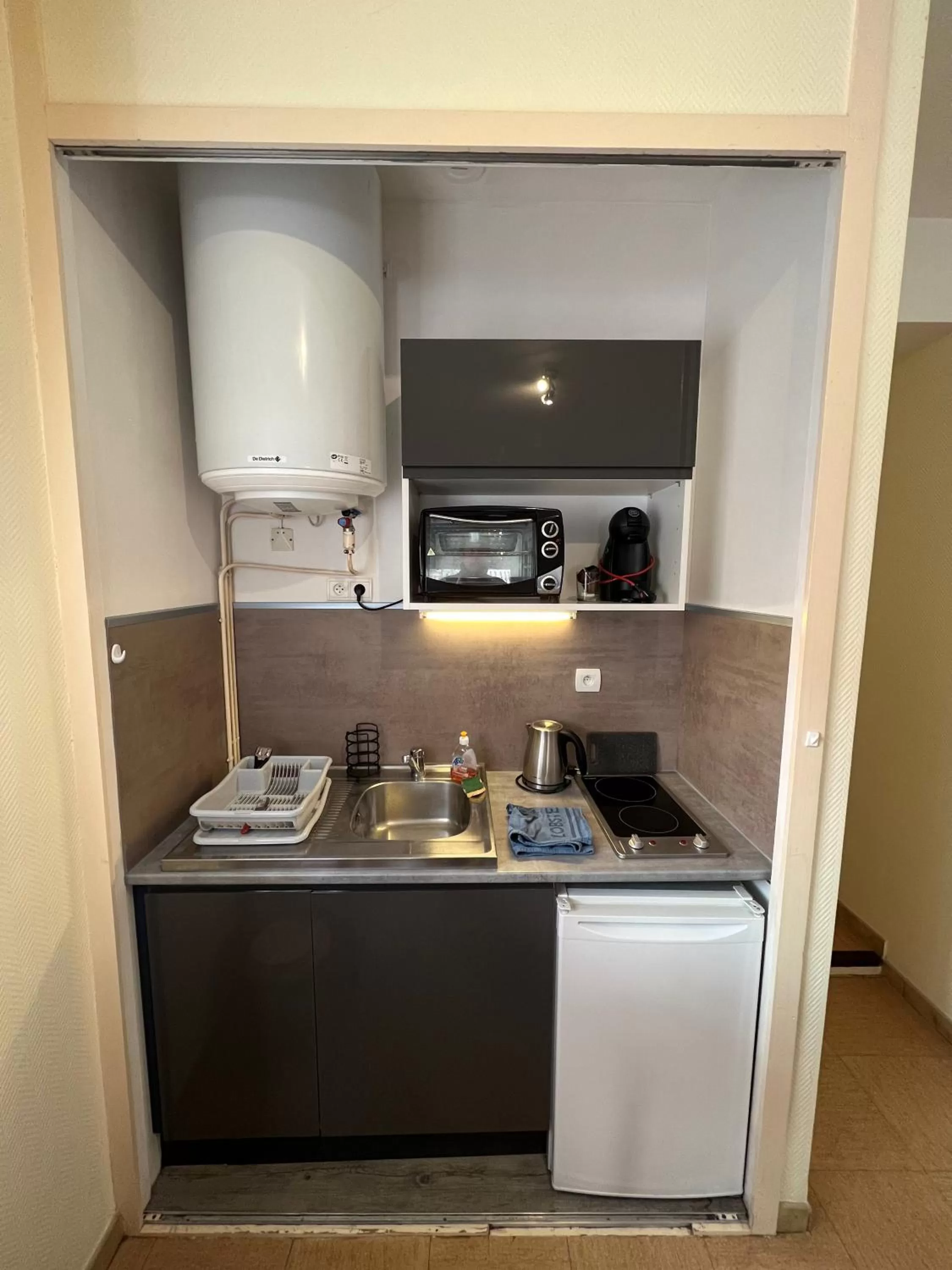 Kitchen or kitchenette in Résidence Aramis