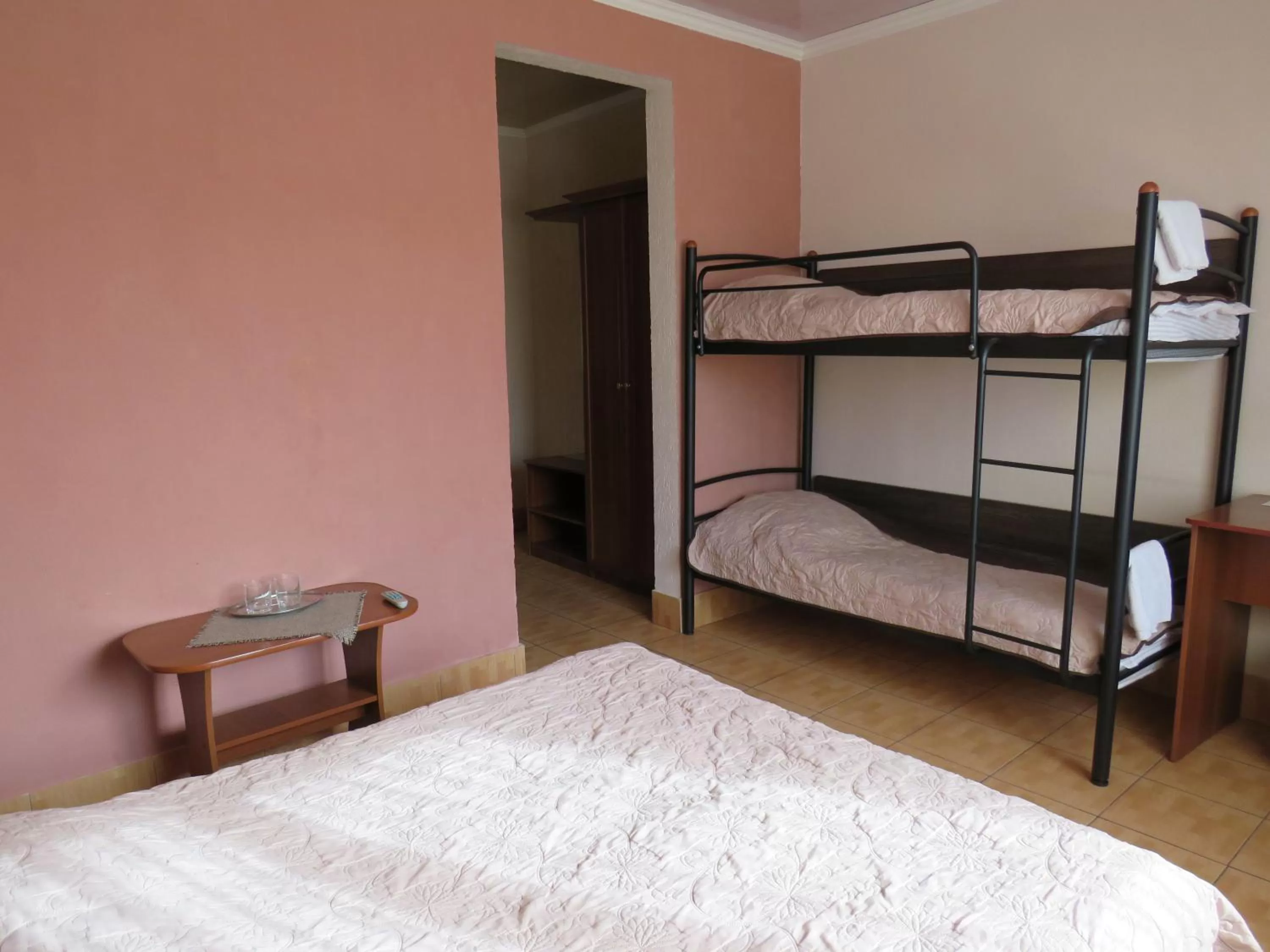 Bed in Monte-Kristo Hotel