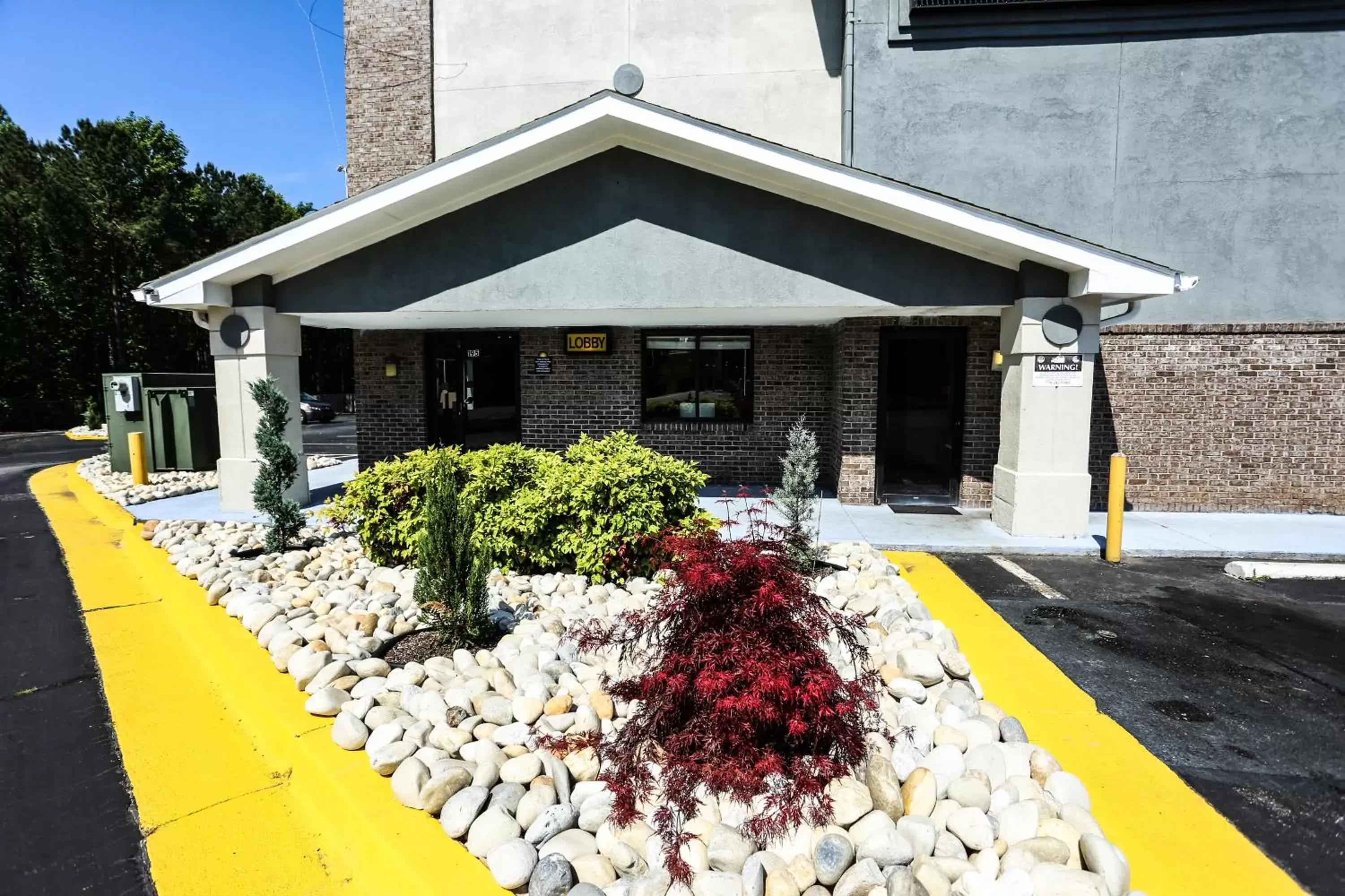 Property building in Super 8 by Wyndham Villa Rica Property building in Super 8 by Wyndham Villa Rica