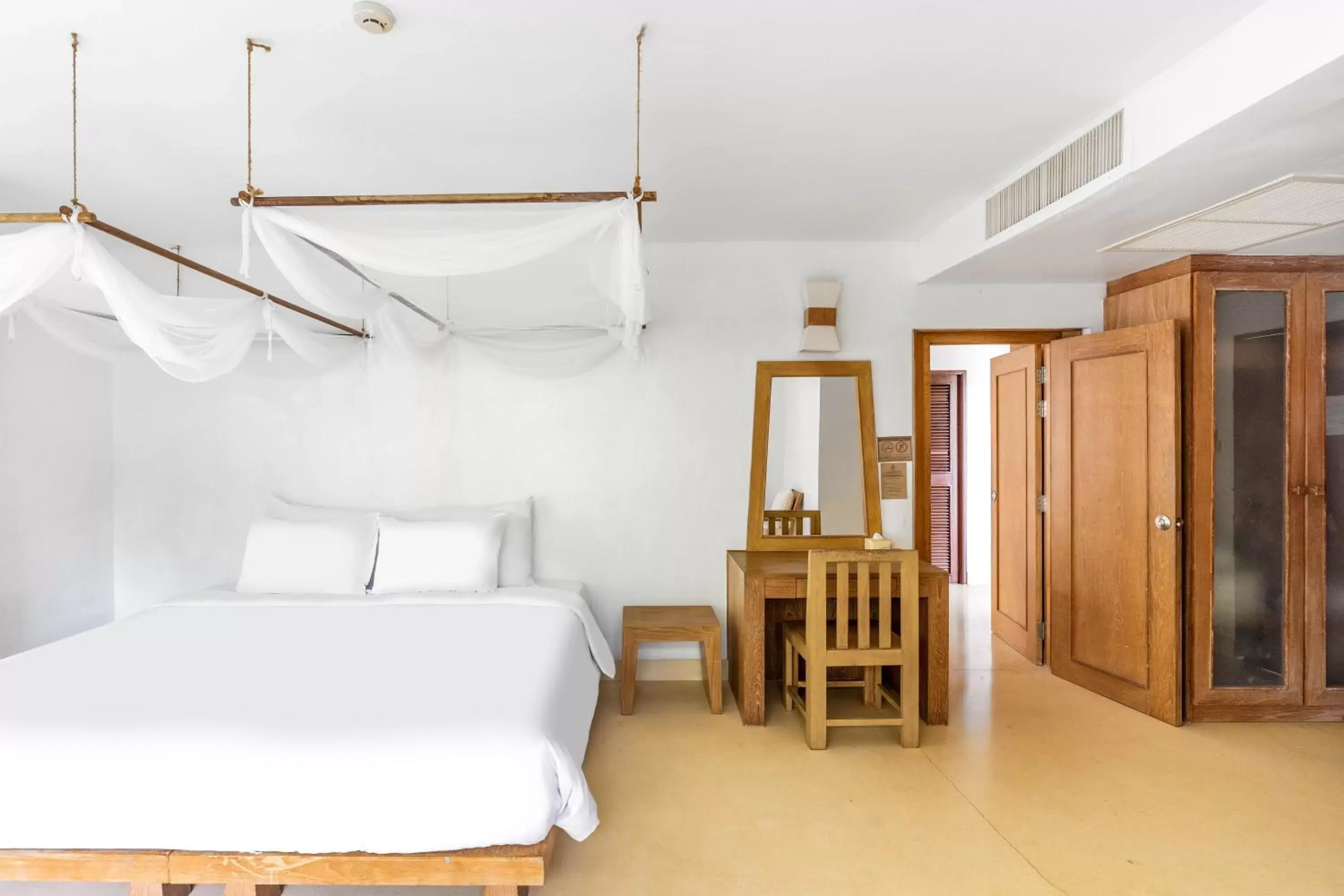 Bedroom in AANA Resort & Villas Koh Chang Bedroom in AANA Resort & Villas Koh Chang