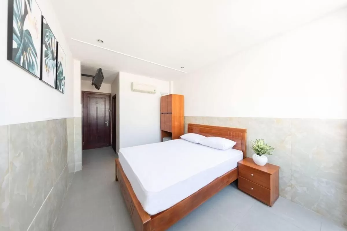 Bed in SaiGon CoZy Hotel "241 Pham Ngu Lao Street''