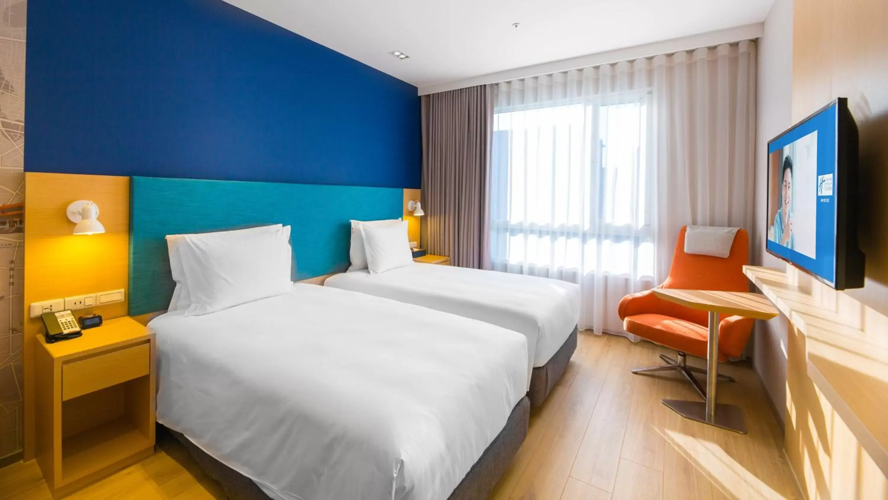 Photo of the whole room, Bed in Holiday Inn Express Taichung Fengchia, an IHG Hotel