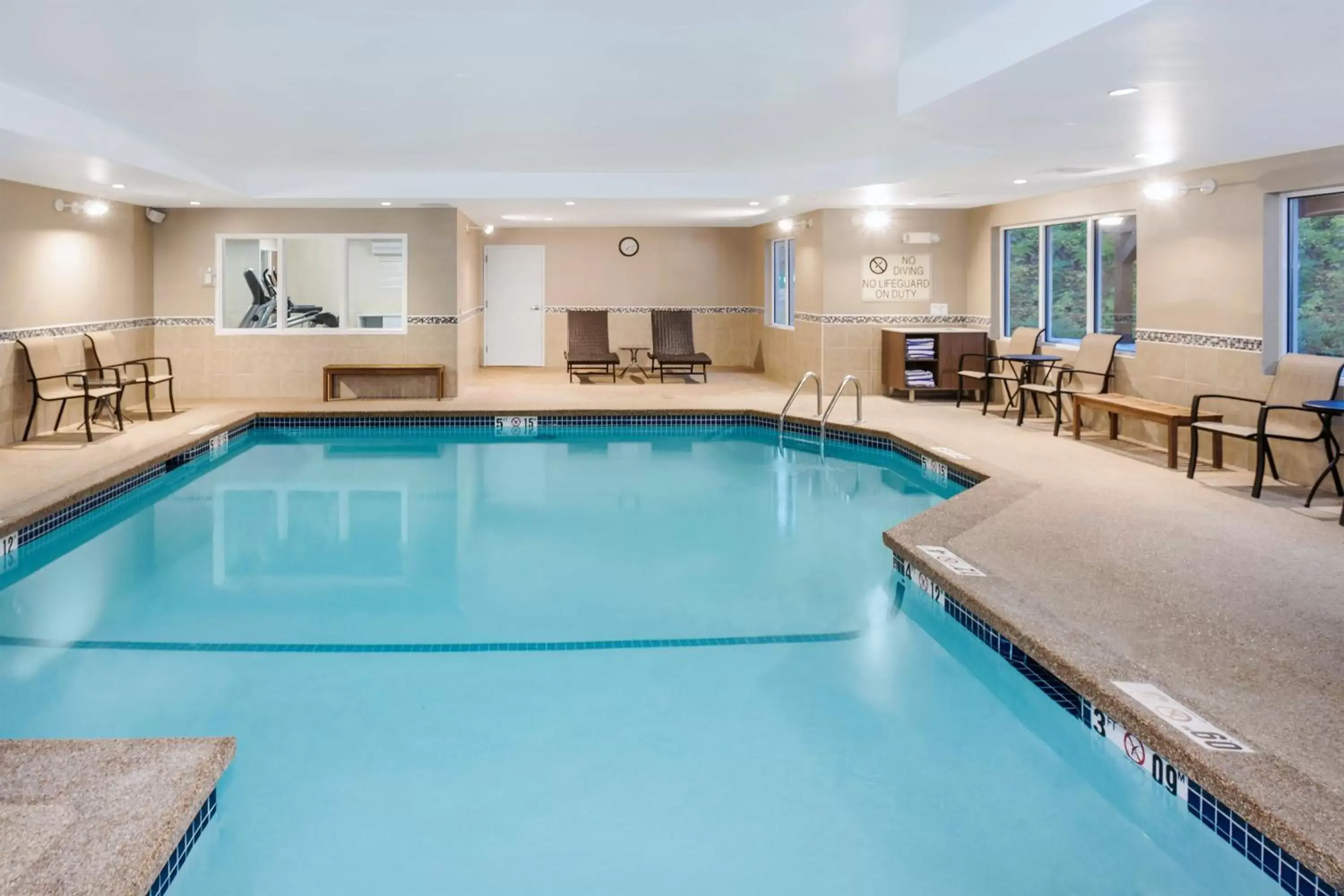 Swimming Pool in Holiday Inn Express Hotel & Suites Hampton South-Seabrook, an IHG Hotel