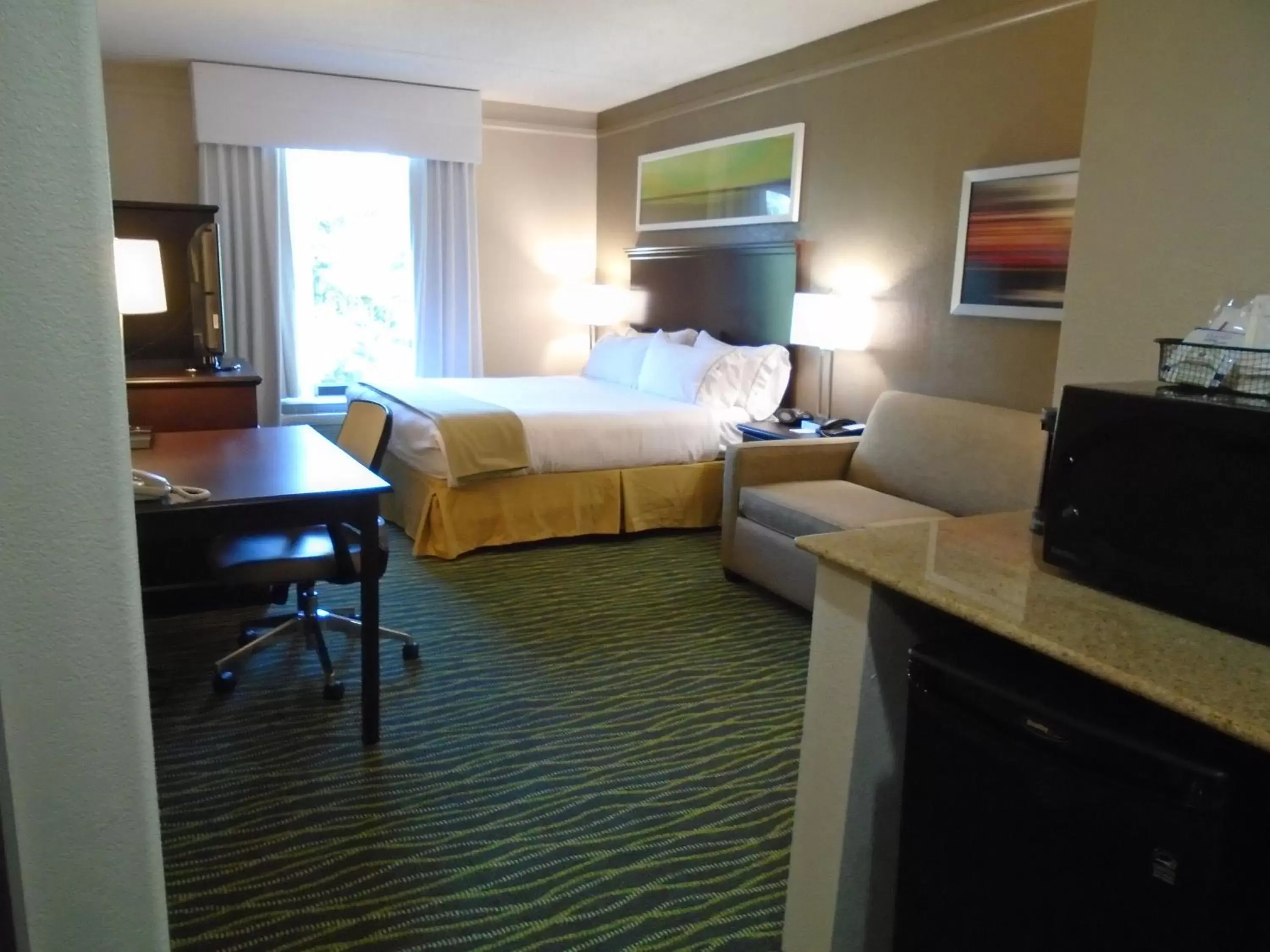 Photo of the whole room, TV/Entertainment Center in Holiday Inn Express Hotel & Suites Midlothian Turnpike, an IHG Hotel
