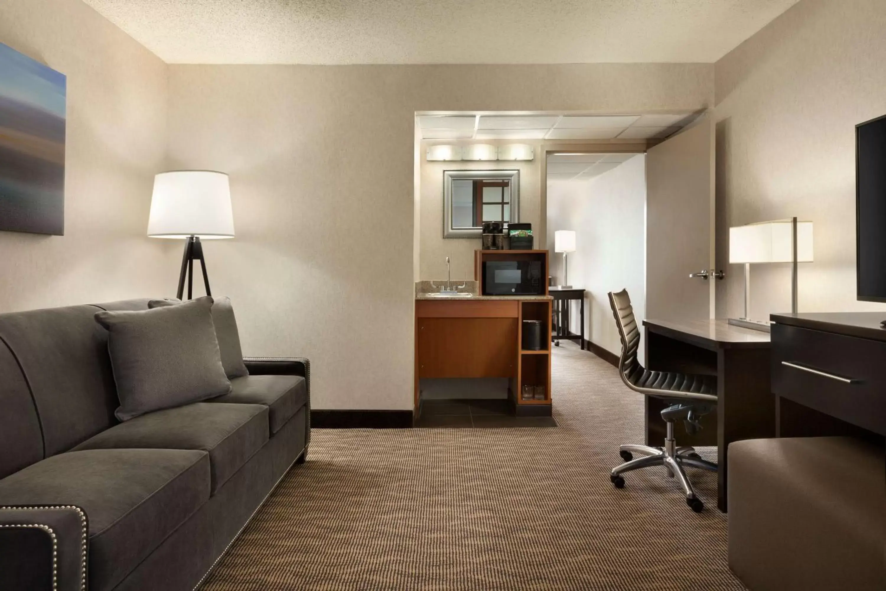 Bedroom, Seating Area in Embassy Suites by Hilton Oklahoma City Will Rogers Airport