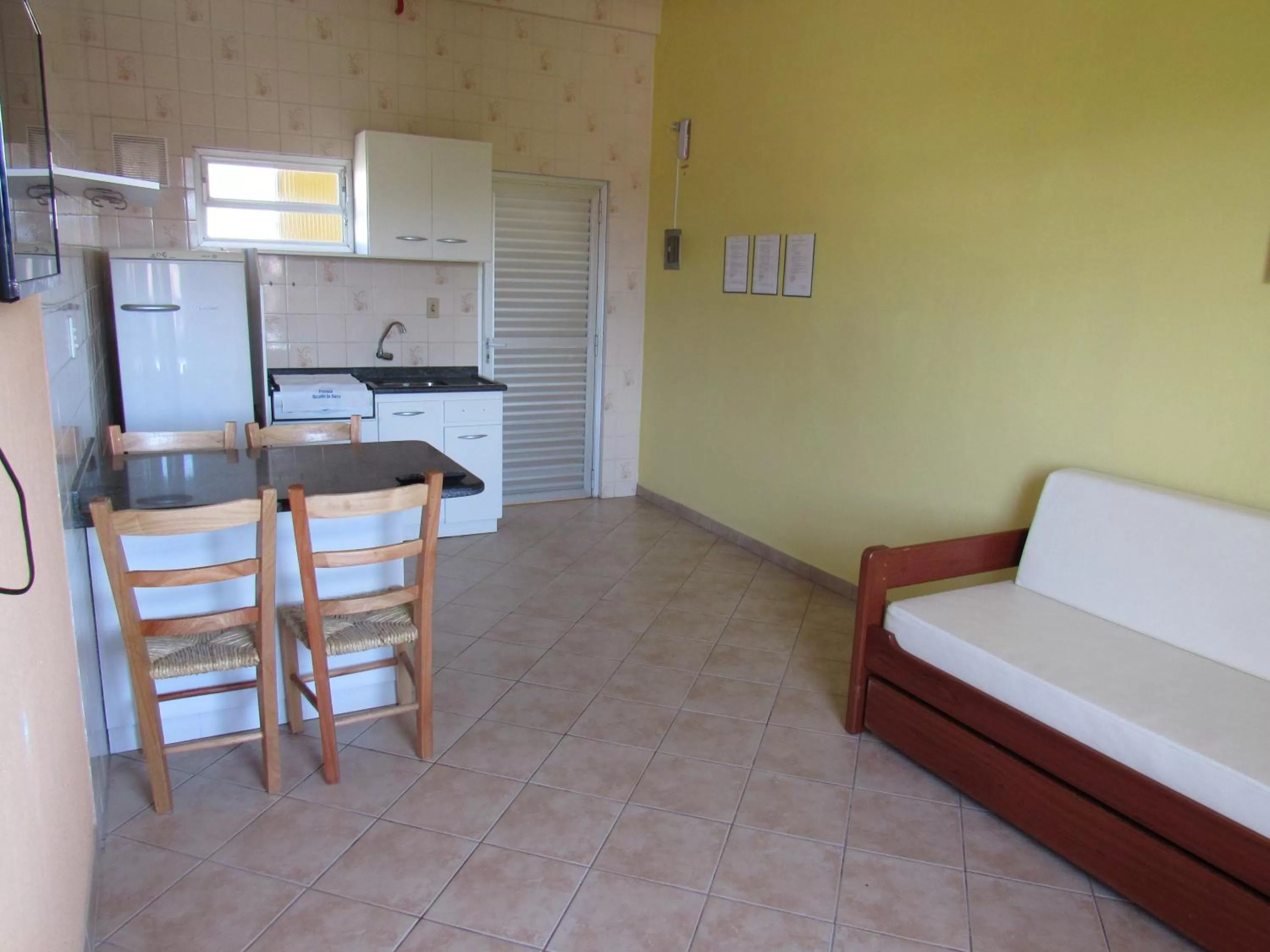Kitchen or kitchenette in Pousada Recanto da Barra