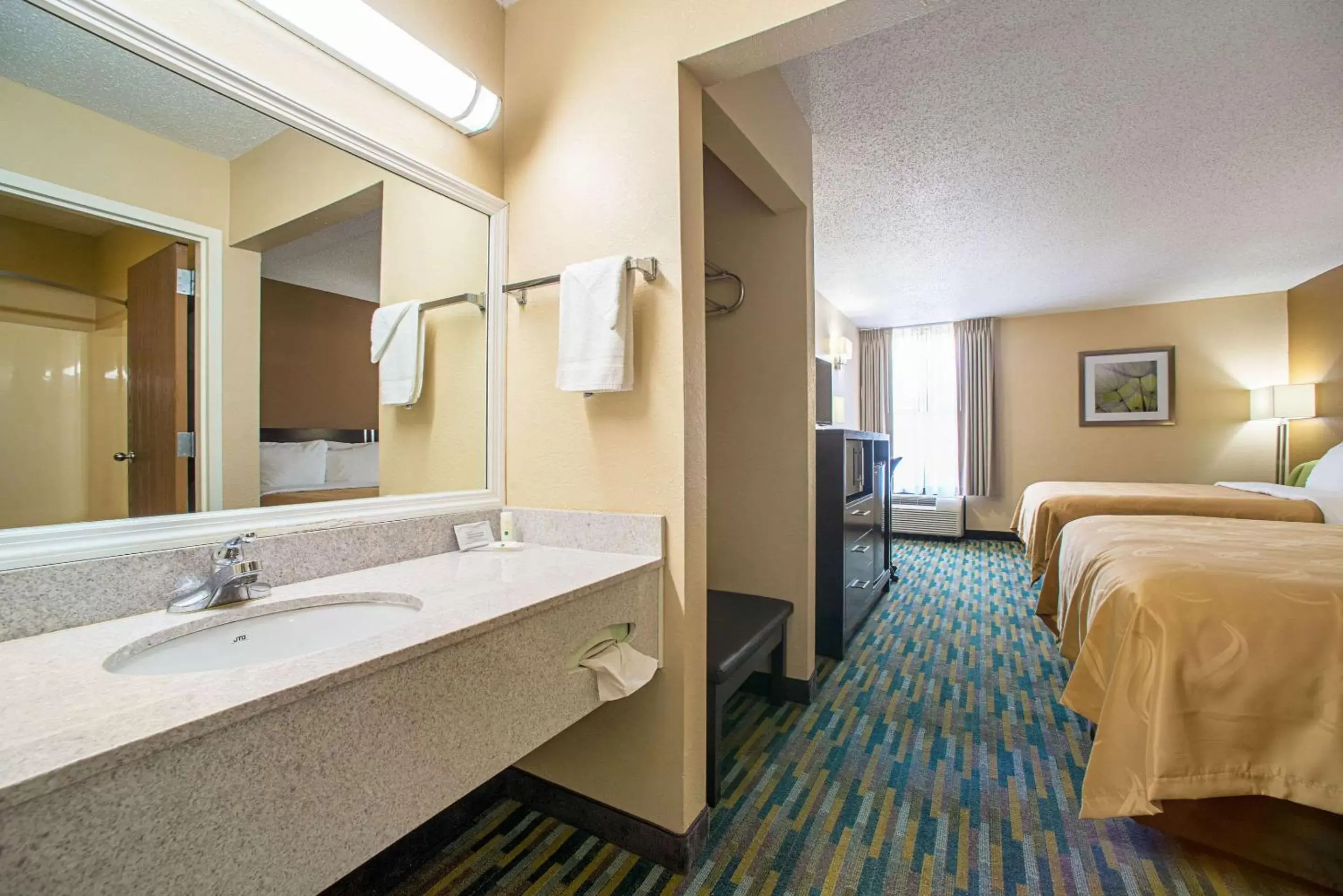 Photo of the whole room, Bathroom in Quality Inn Near Six Flags St. Louis