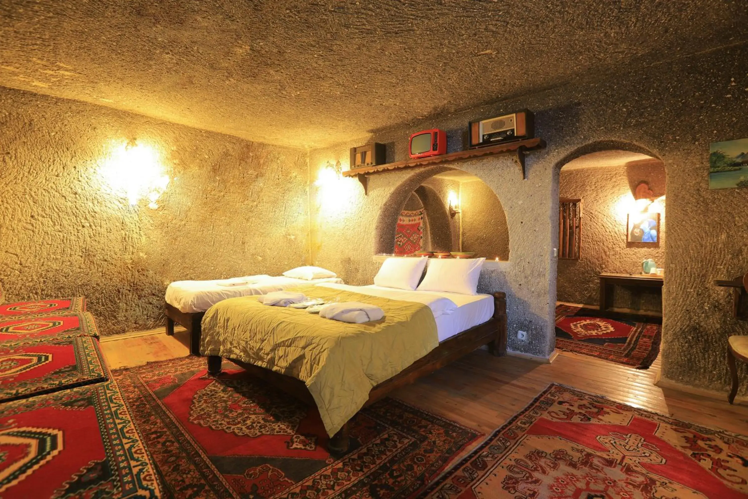 Bed in Antique Terrace Cave Suites