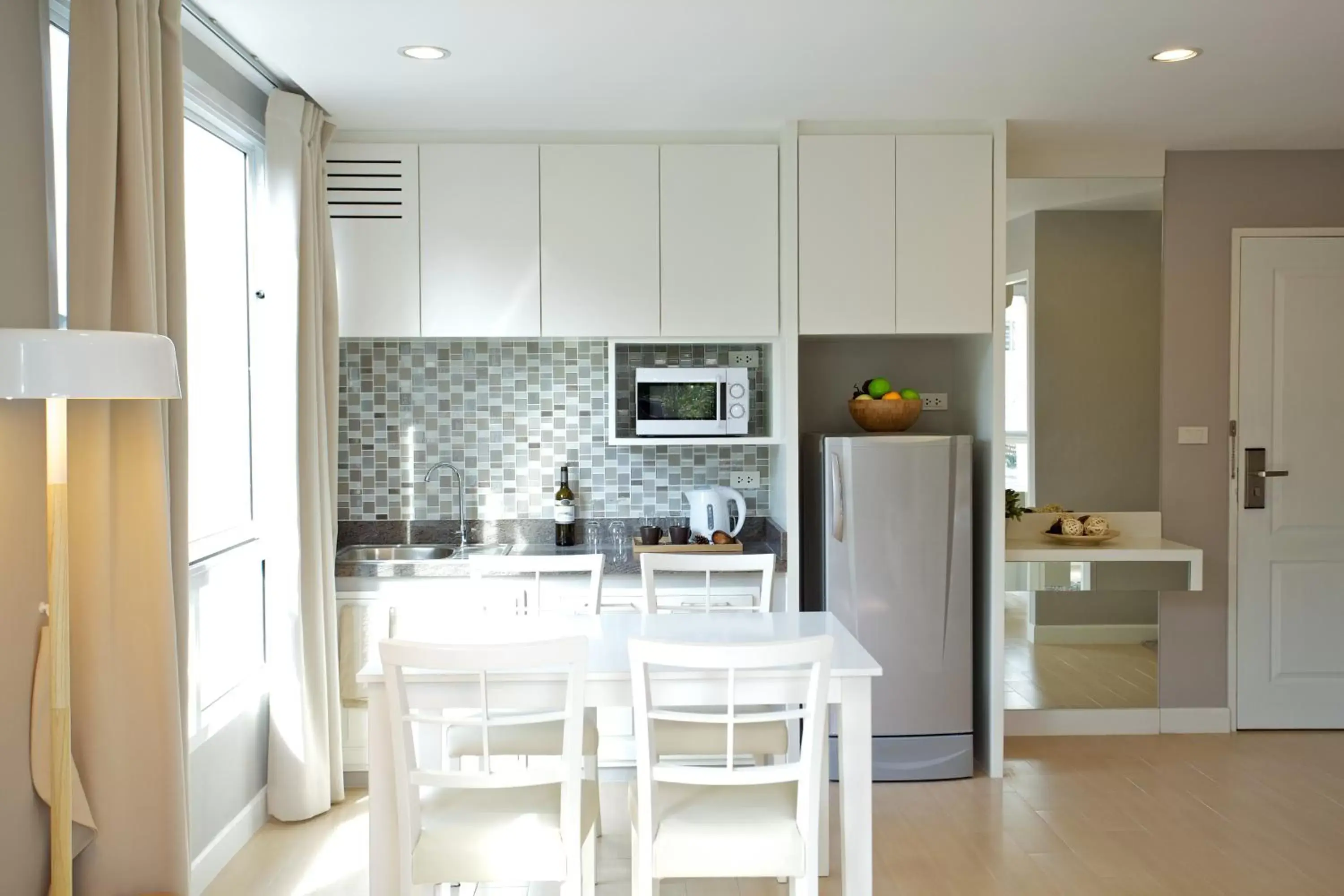 Living room, Kitchen/Kitchenette in Cinnamon Residence SHA Plus