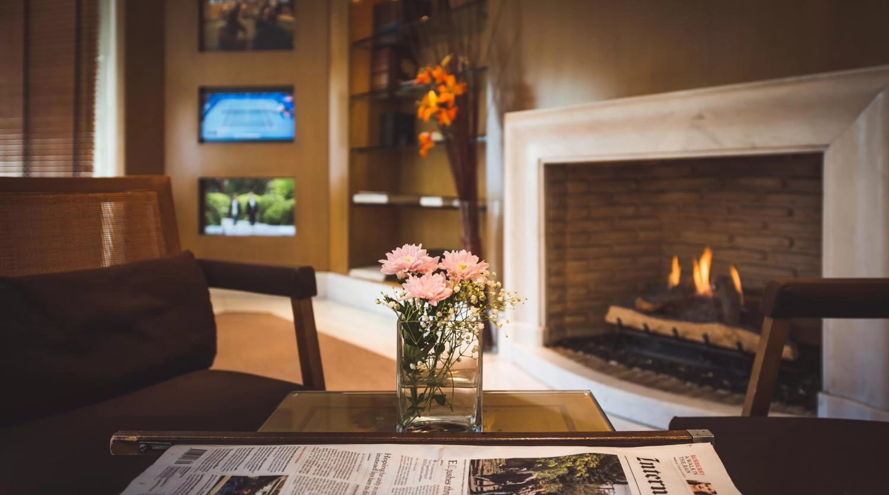 Communal lounge/ TV room in Golden Age Athens Hotel