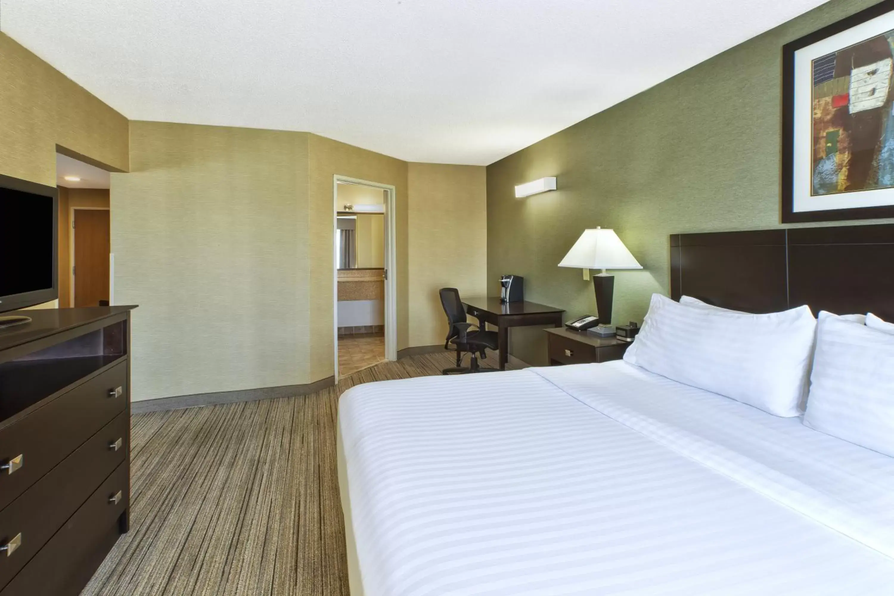 Bed in Country Inn & Suites by Radisson Benton Harbor-St Joseph MI
