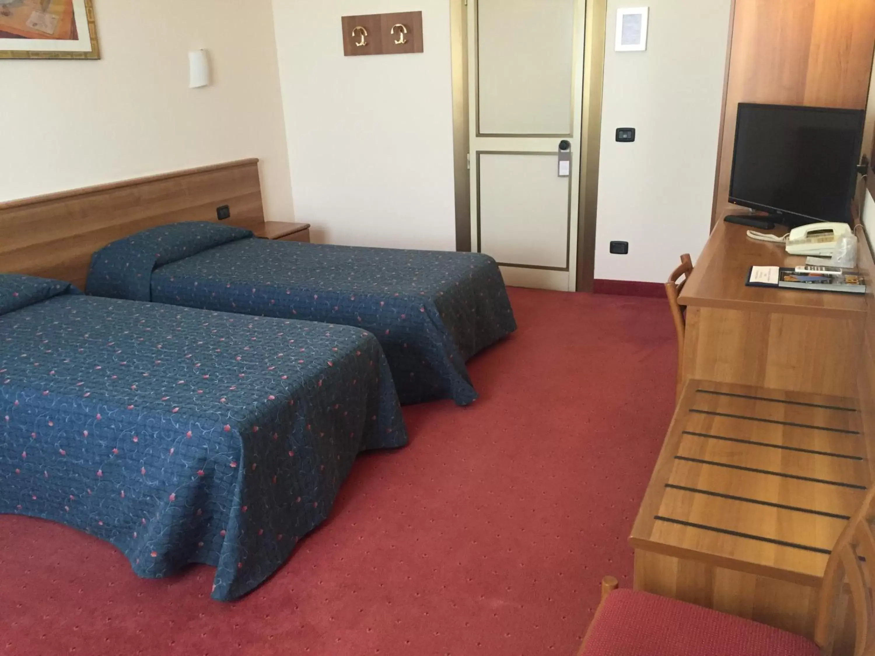 Photo of the whole room, Bed in Hotel Arcobaleno