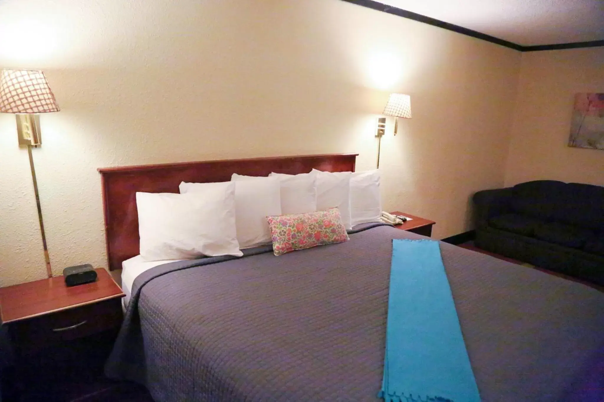 Bed in The Inn and Suites at 34 Fifty