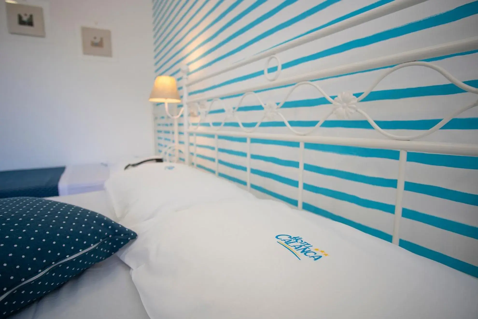 Bed in Hotel Calanca