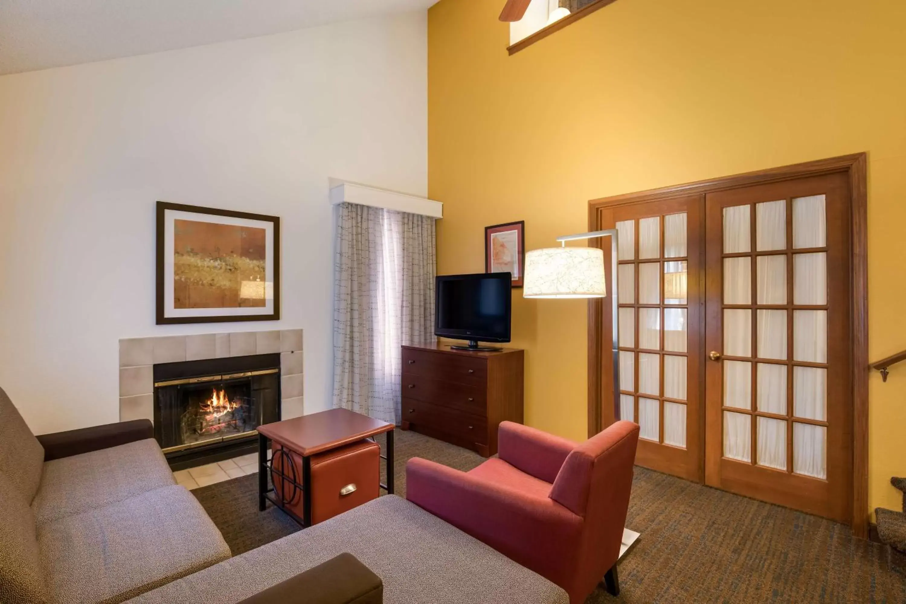 Photo of the whole room, TV/Entertainment Center in SenS Suites Livermore; SureStay Collection by Best Western