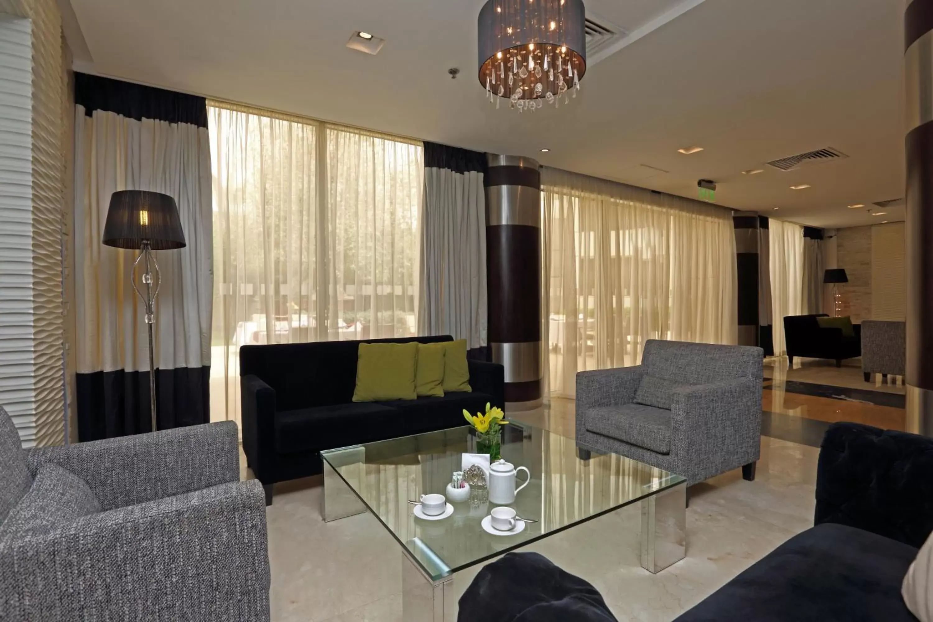 Property building, Seating Area in Holiday Inn Riyadh Izdihar, an IHG Hotel