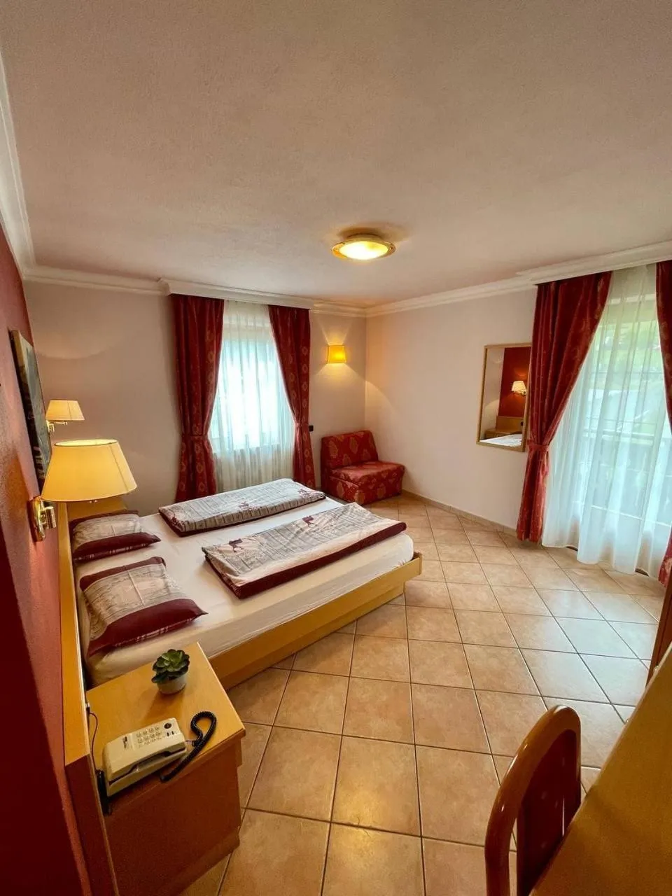 Photo of the whole room, Bed in Hotel Garni Rin Da Rin