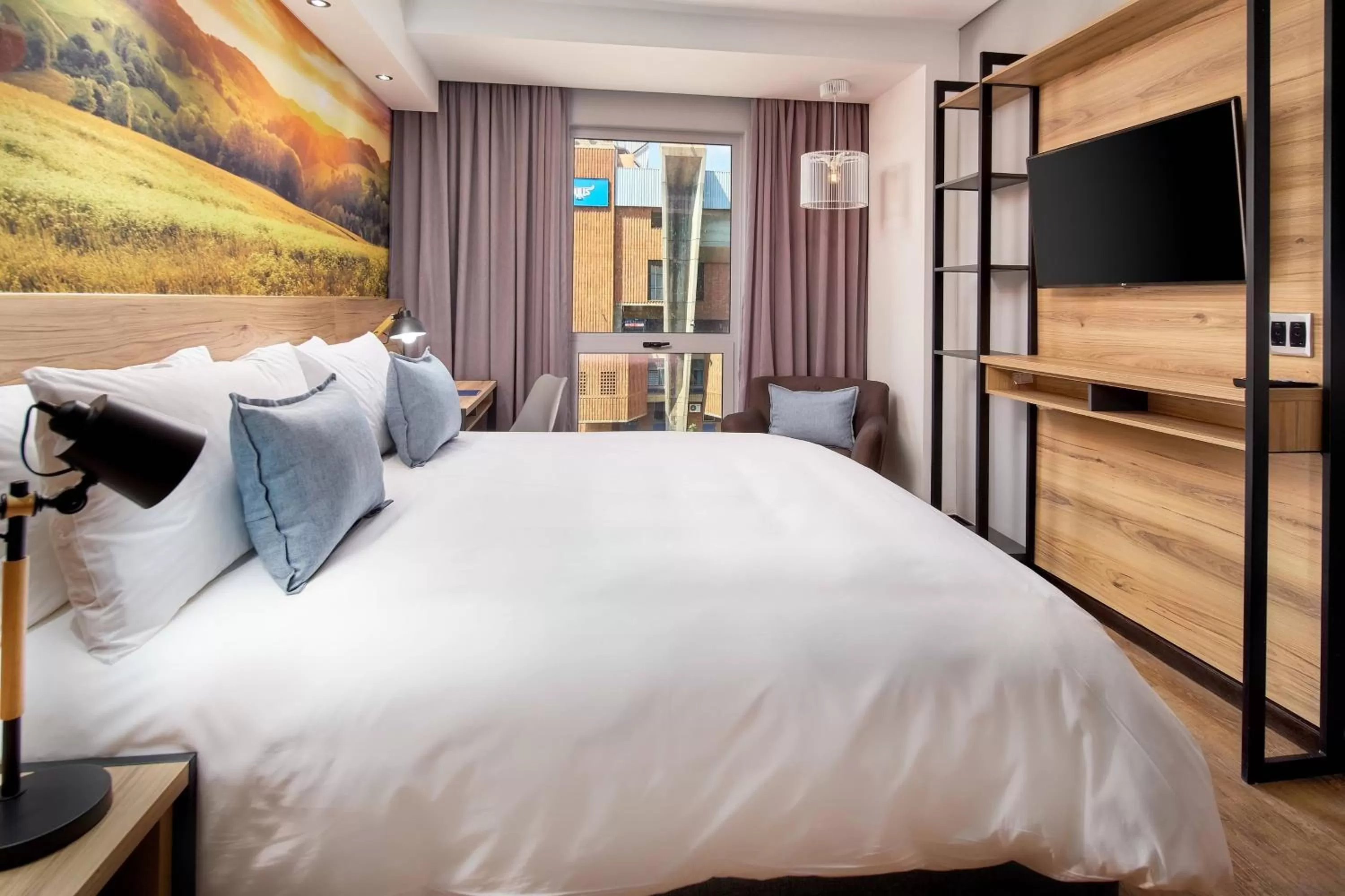 Photo of the whole room, Bed in Protea Hotel by Marriott Pretoria Loftus Park