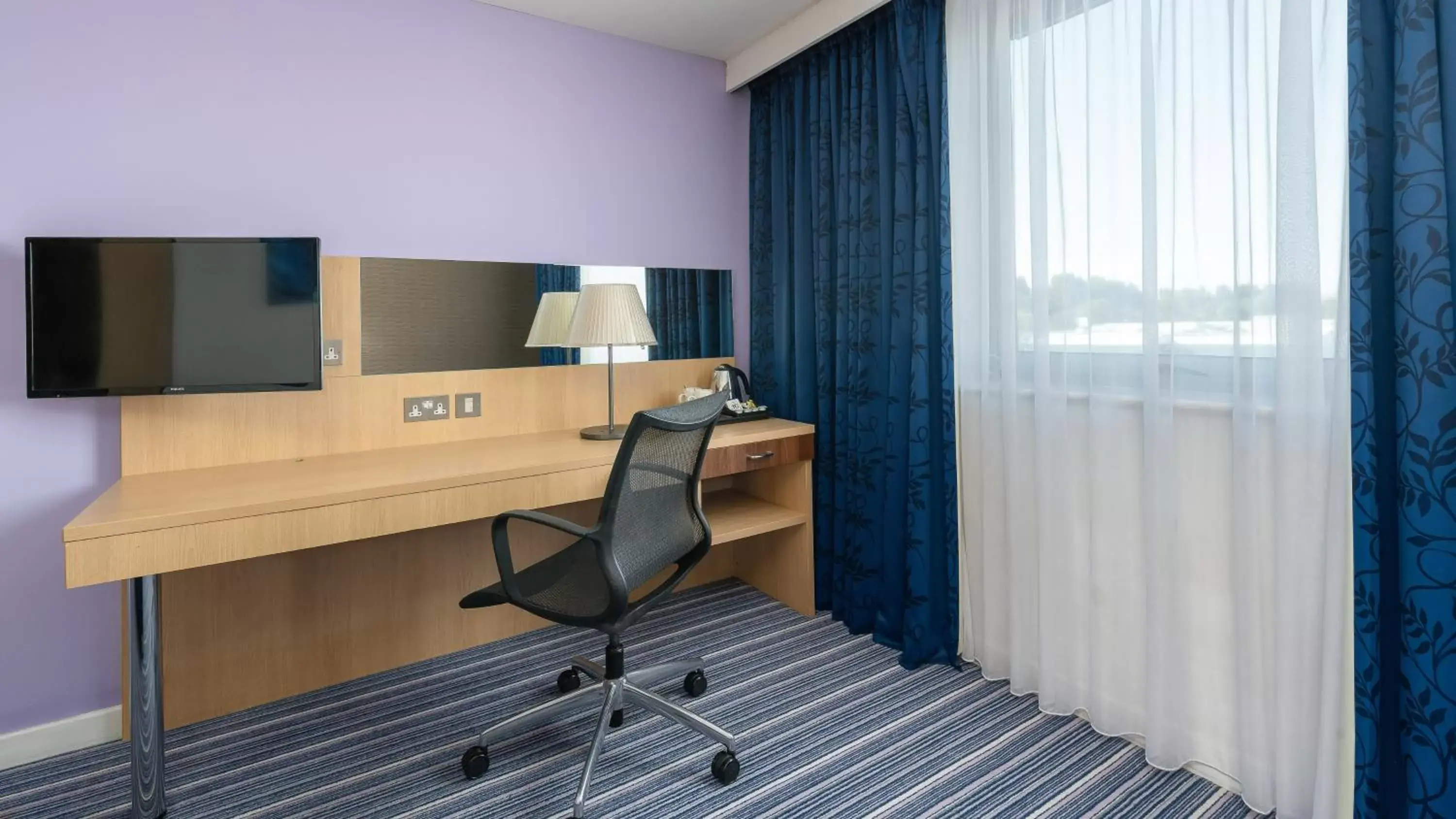 TV and multimedia, TV/Entertainment Center in Holiday Inn Express Leigh - Sports Village, an IHG Hotel