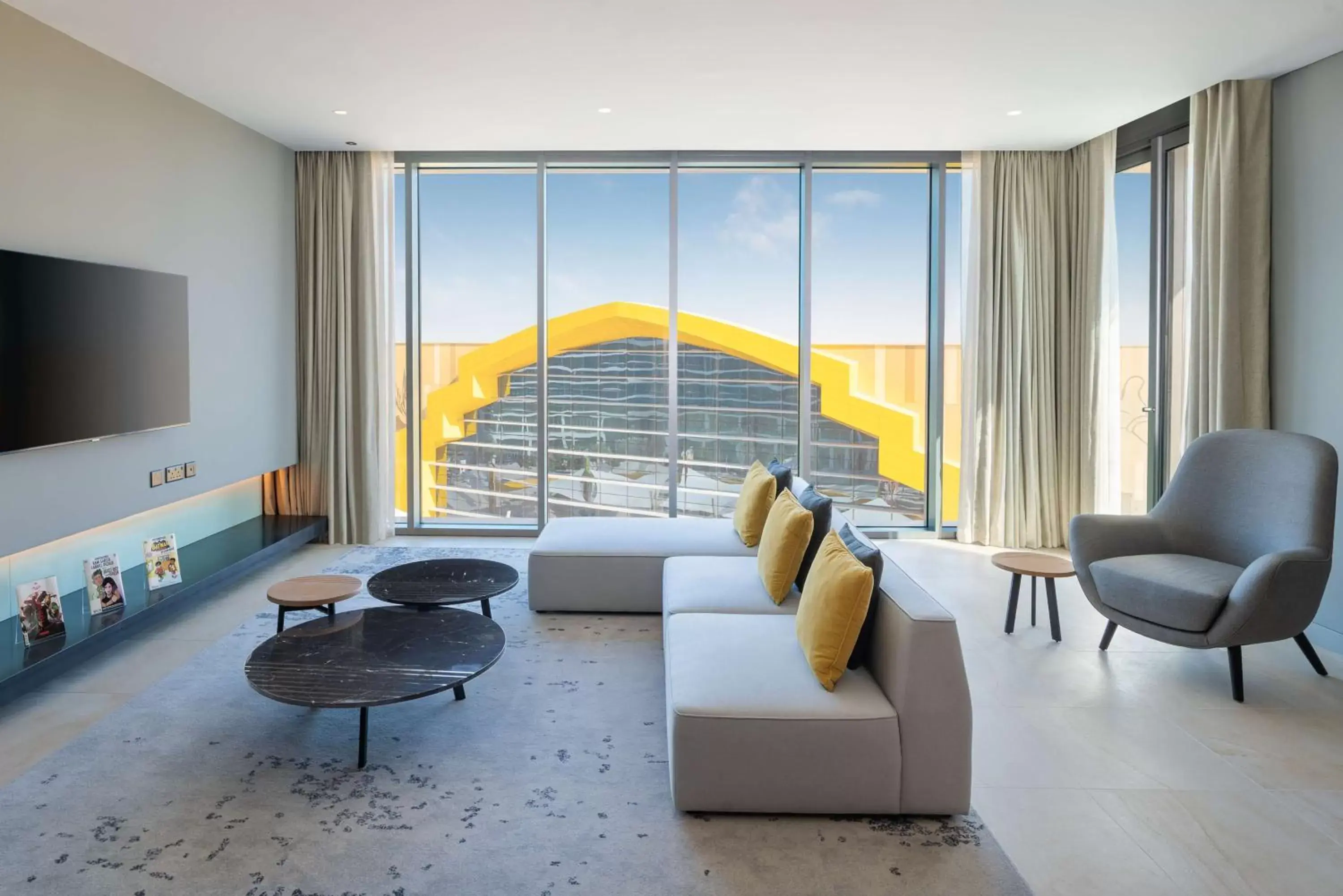 Living room, Seating Area in The WB Abu Dhabi, Curio Collection By Hilton