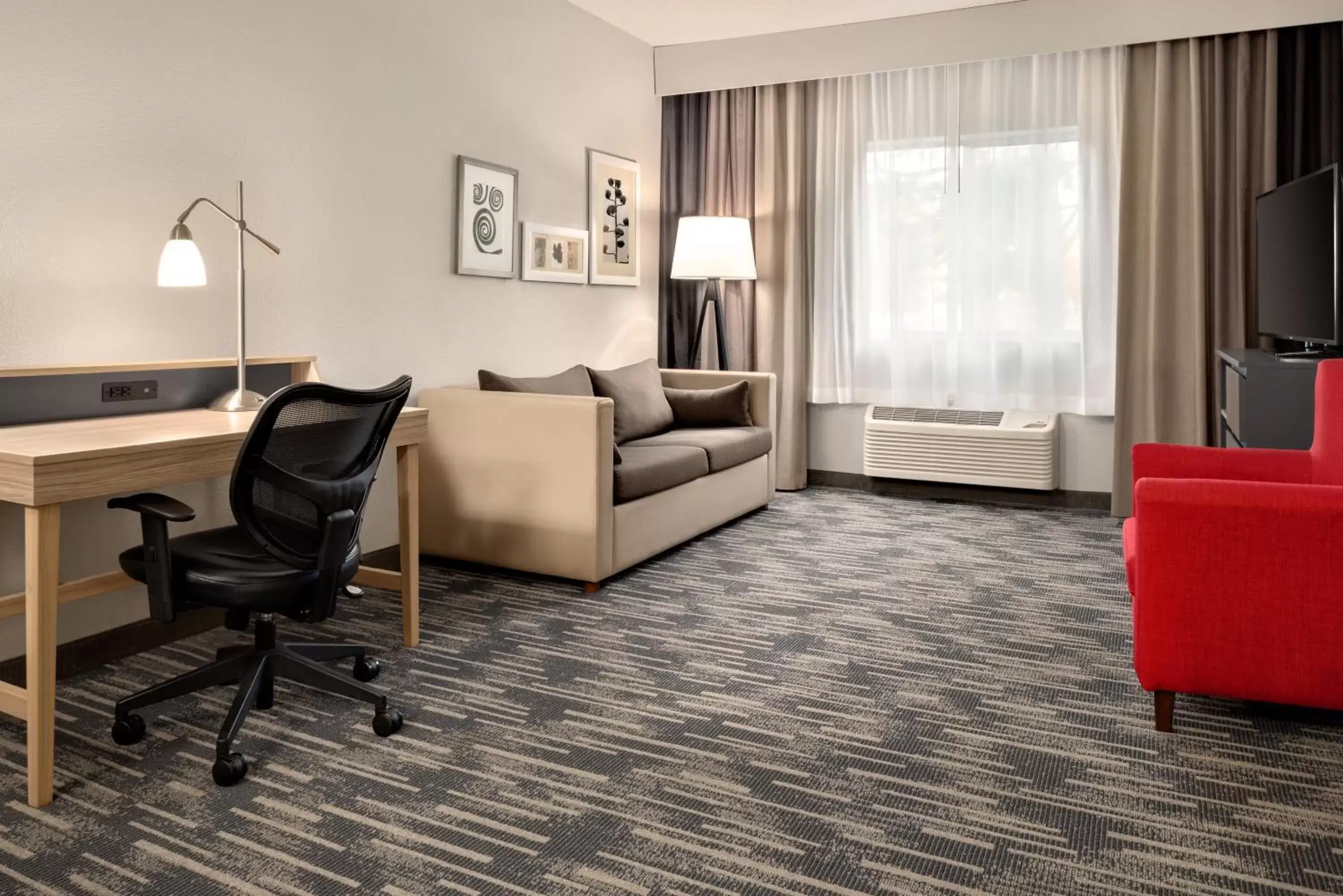 Living room, Seating Area in Country Inn & Suites by Radisson, Brookings