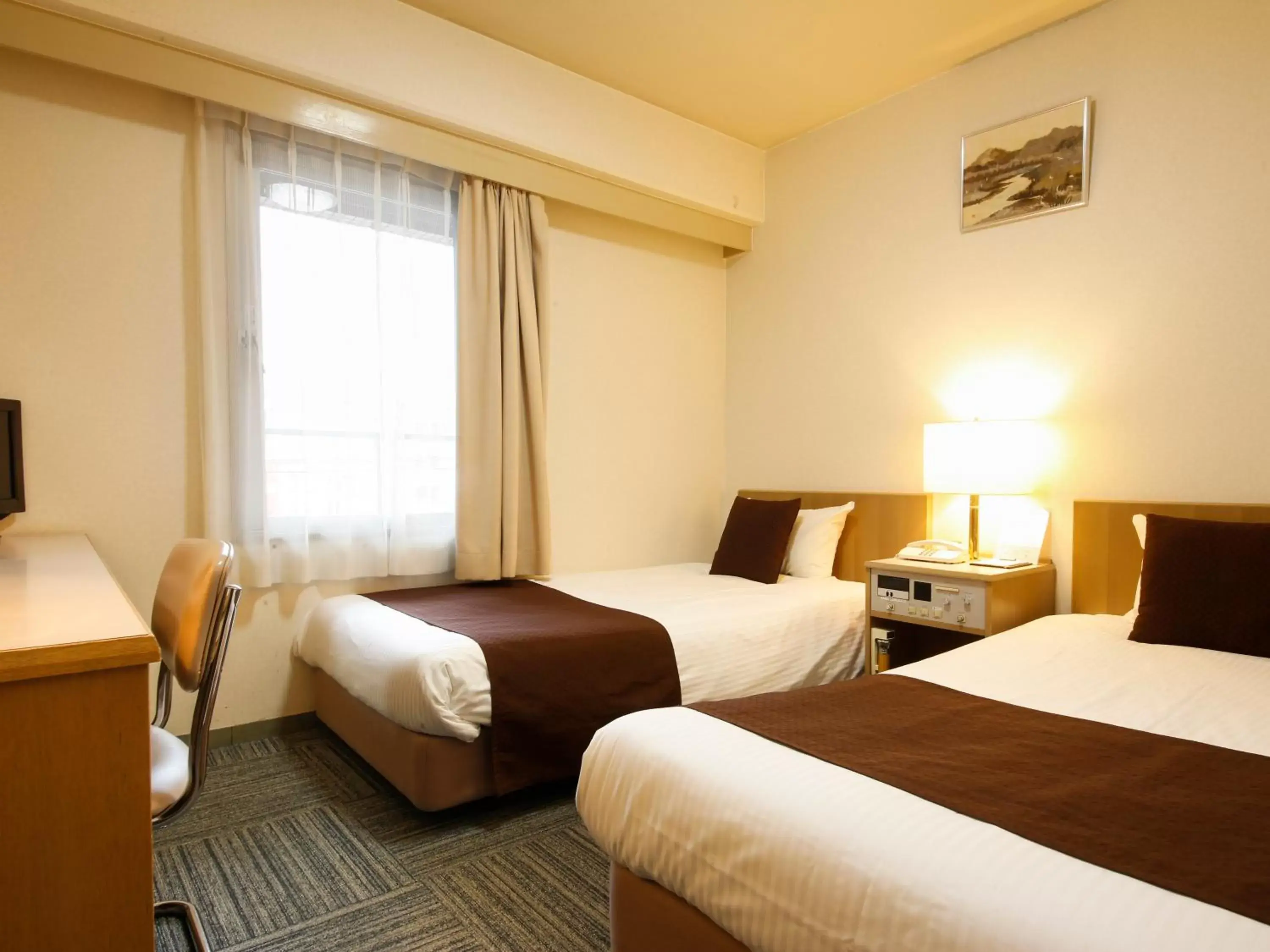 Photo of the whole room, Bed in Shin-Osaka Sunny Stone Hotel