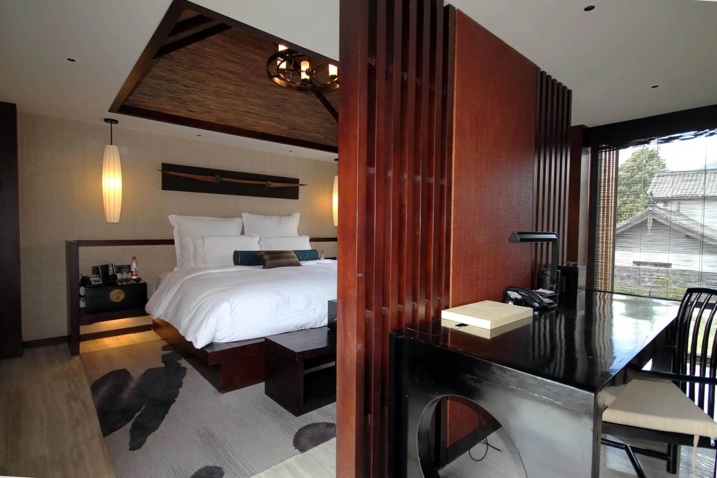 Photo of the whole room, Bed in Pullman Lijiang Resort & Spa