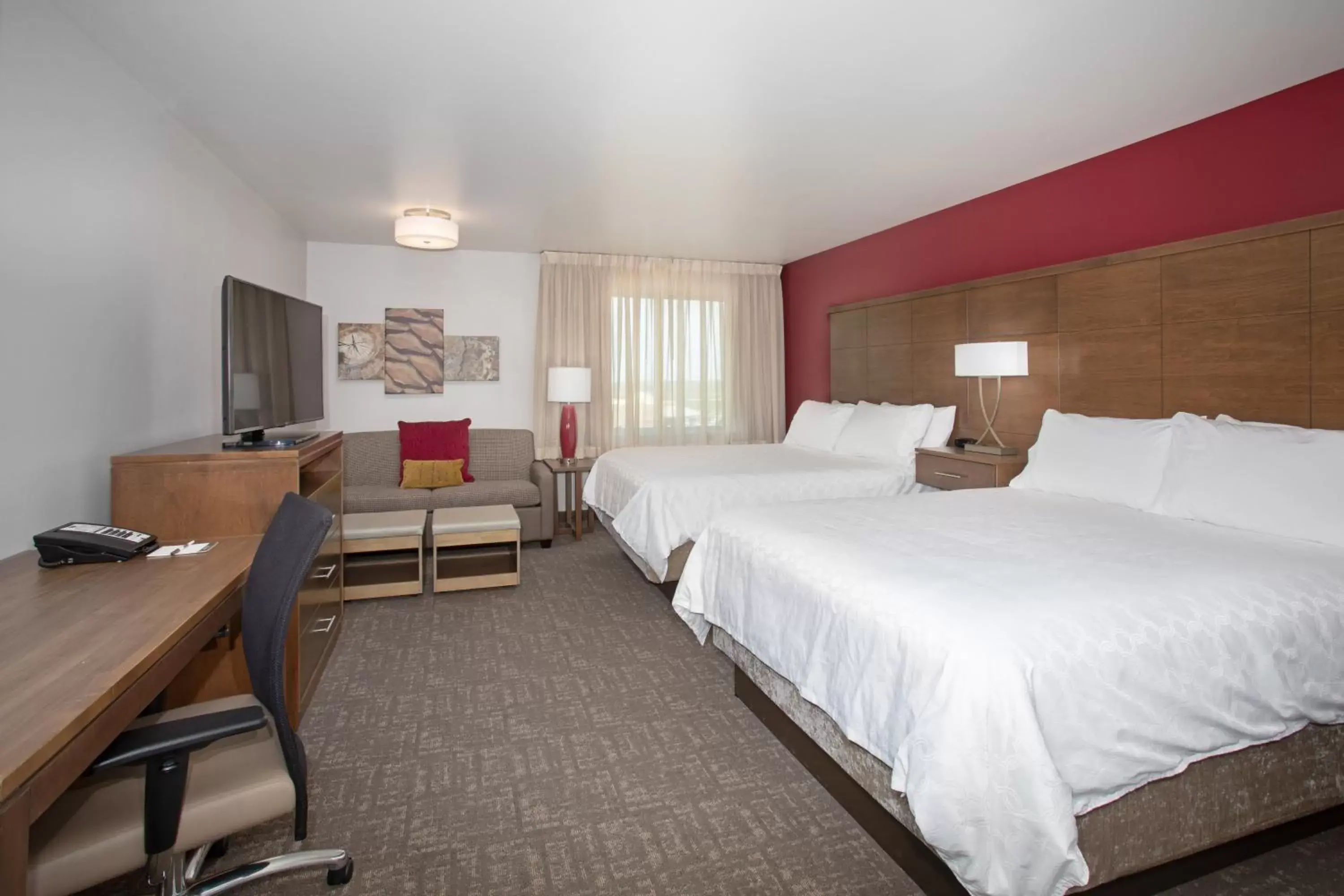 Photo of the whole room, Bed in Staybridge Suites Rapid City - Rushmore, an IHG Hotel