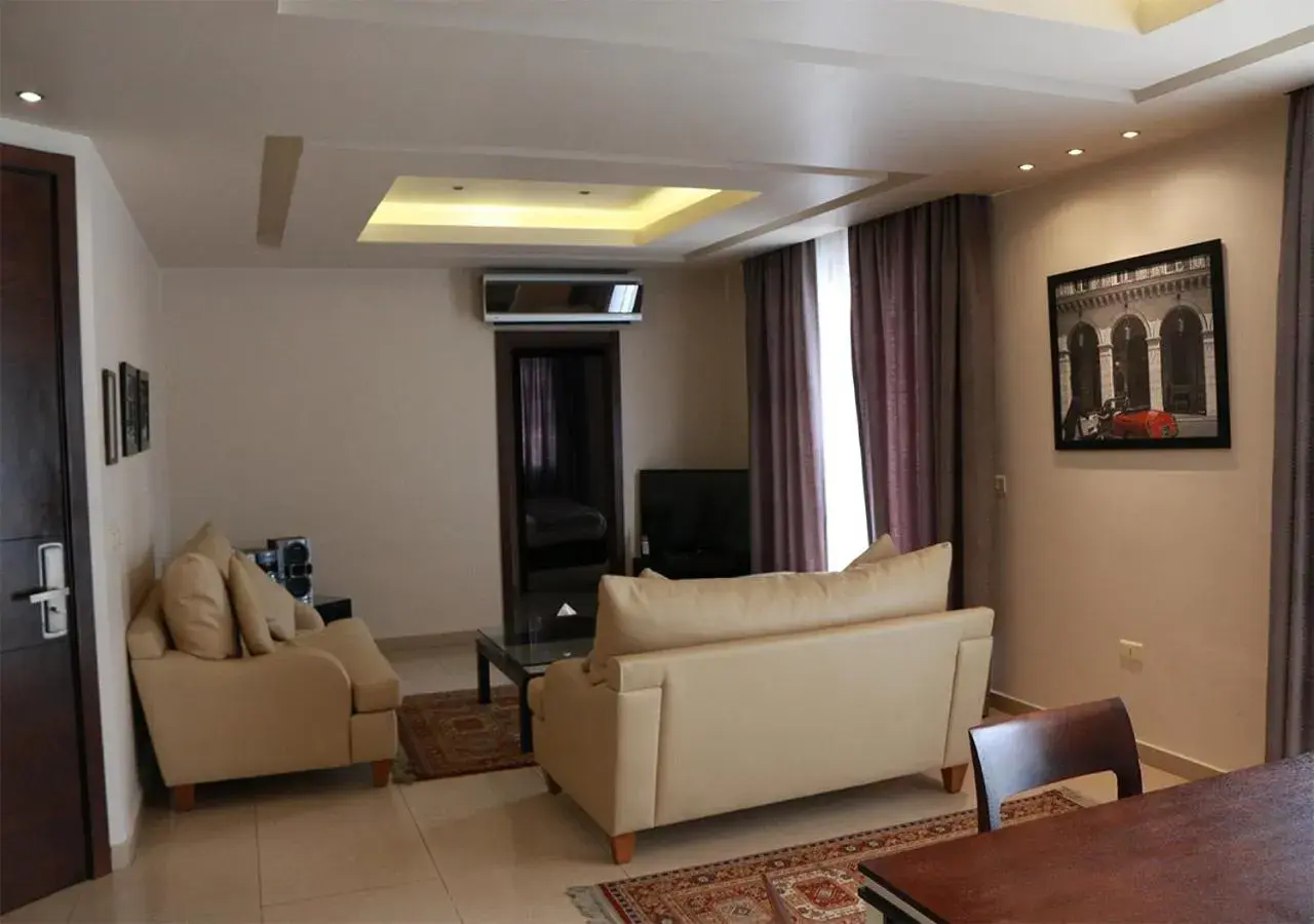 Communal lounge/ TV room, Seating Area in The Parisian Hotel