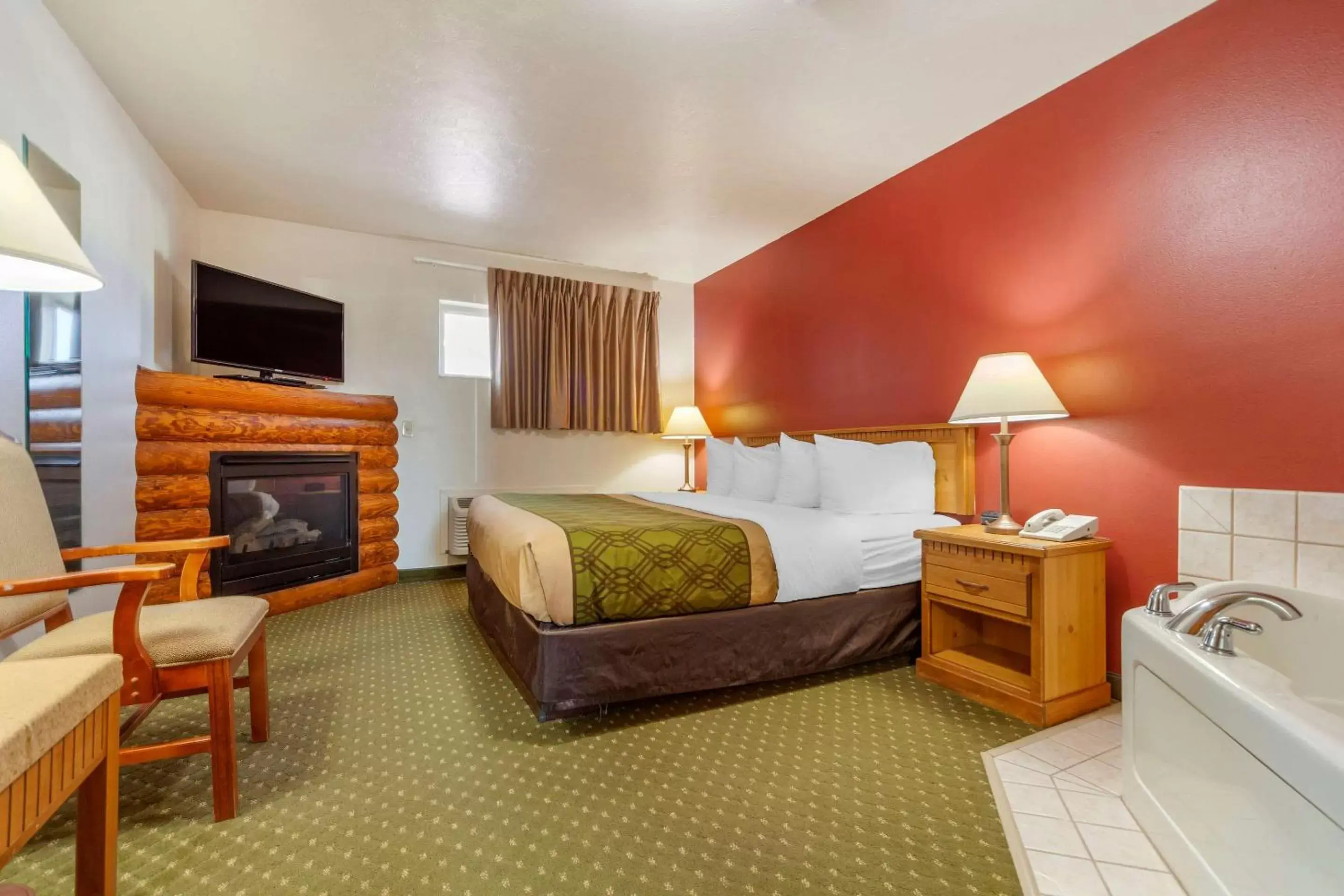 Photo of the whole room, Bed in Harmony Inn & Suites