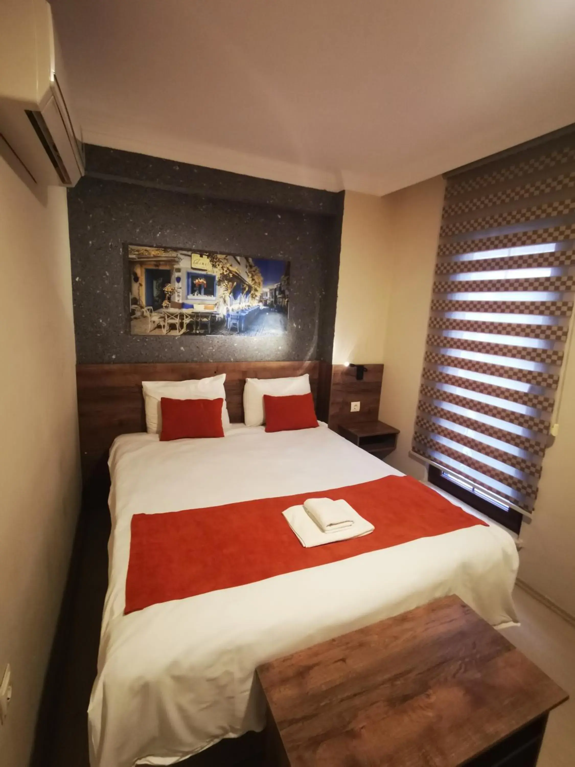 Bed in ADOR TROIA HOTEL