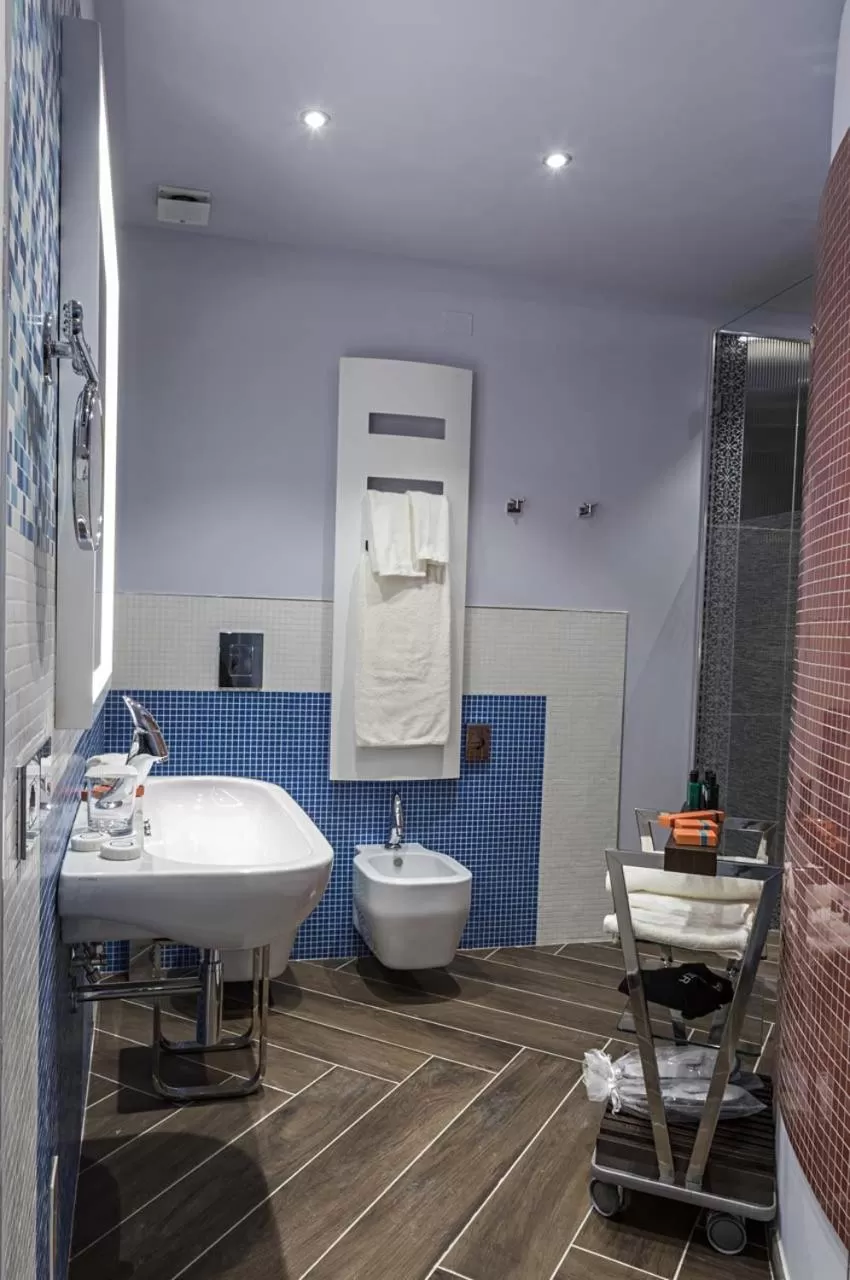 Shower in Borgo San Barbato Resort Spa & Golf