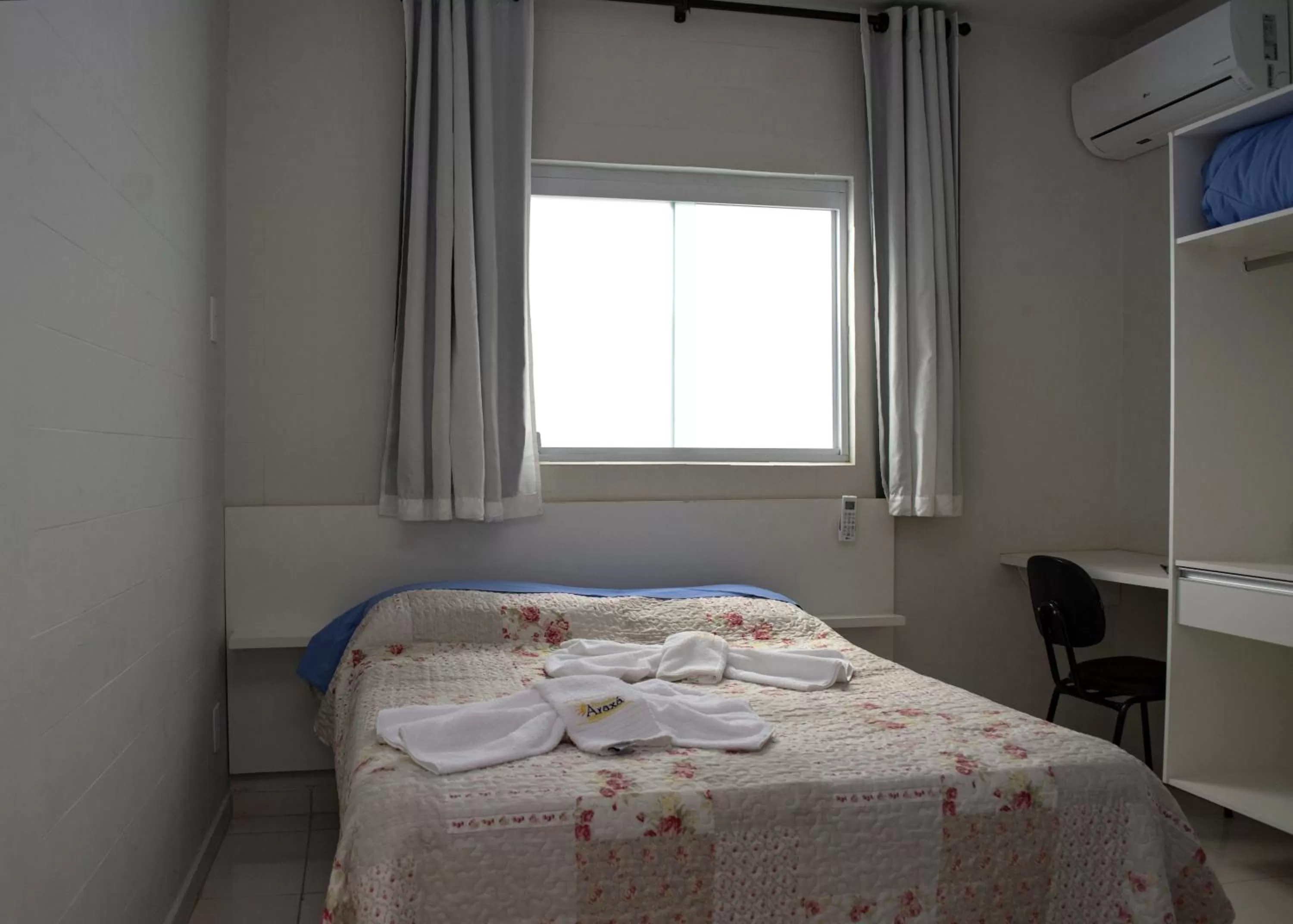 Bed in Pousada Araxá