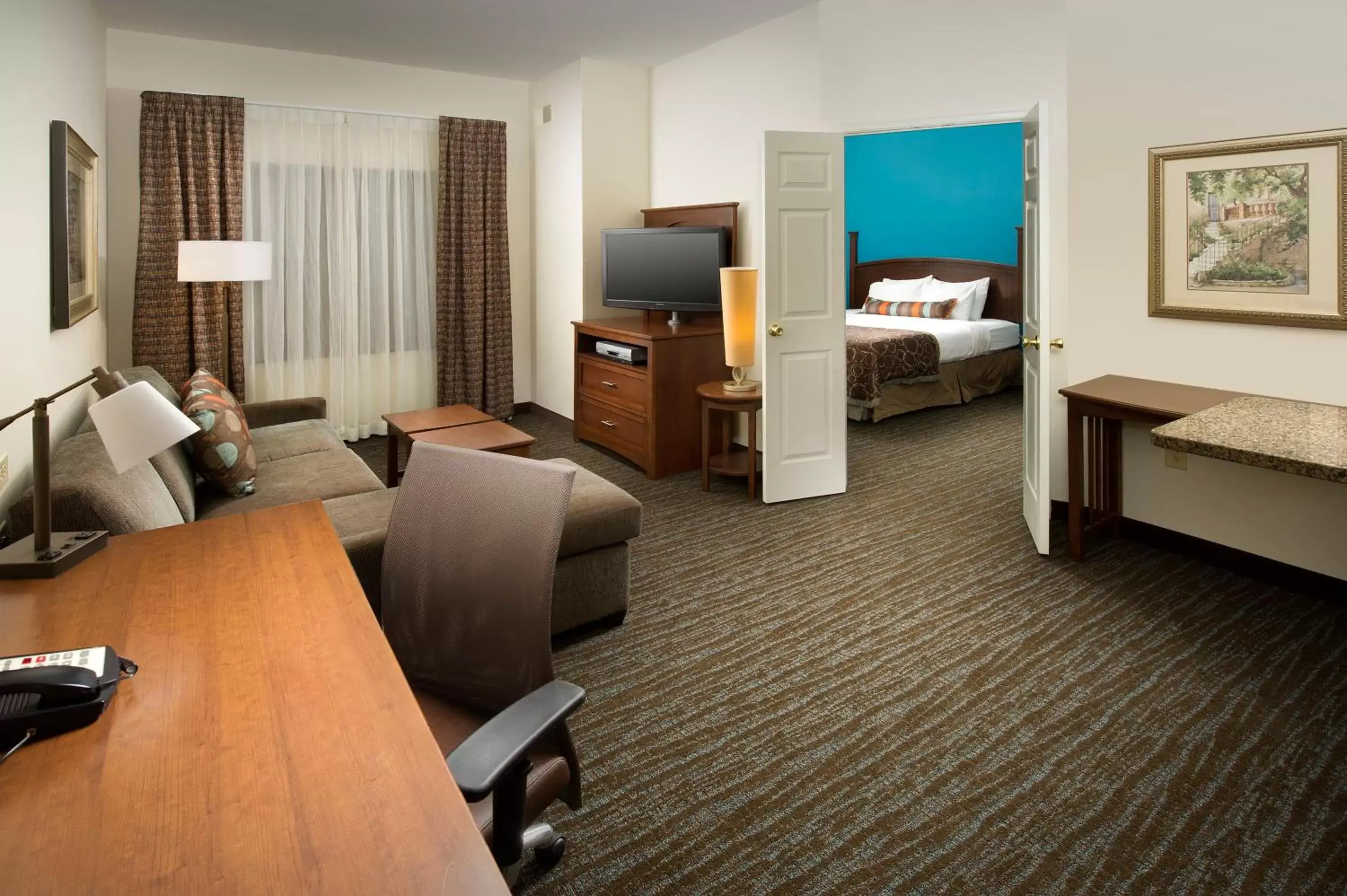 Photo of the whole room, TV/Entertainment Center in Staybridge Suites Baltimore BWI Airport, an IHG Hotel