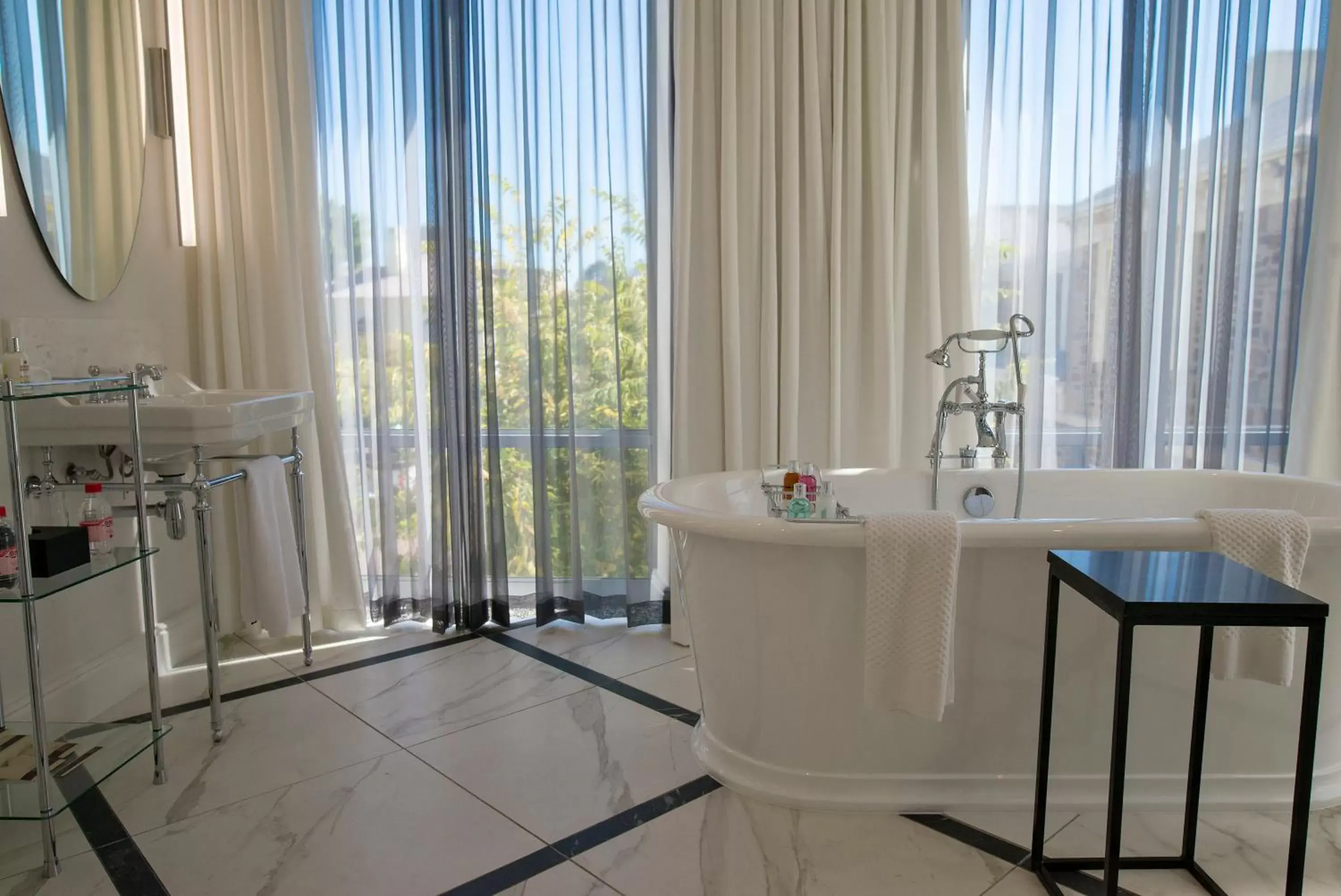 Bathroom in The Manor House at the Queen Victoria Hotel by NEWMARK